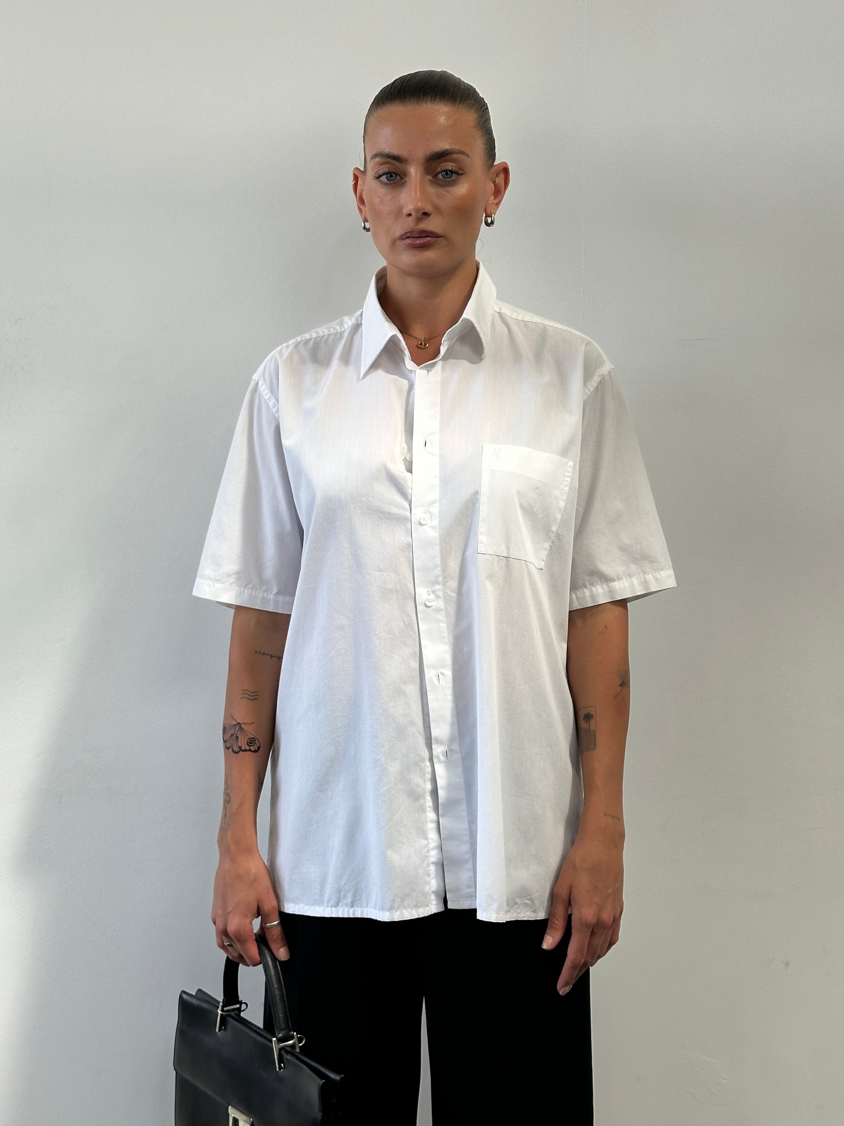 Yves Saint Laurent Pour Homme cotton short sleeve logo shirt in size L, featuring classic design and signature branding.