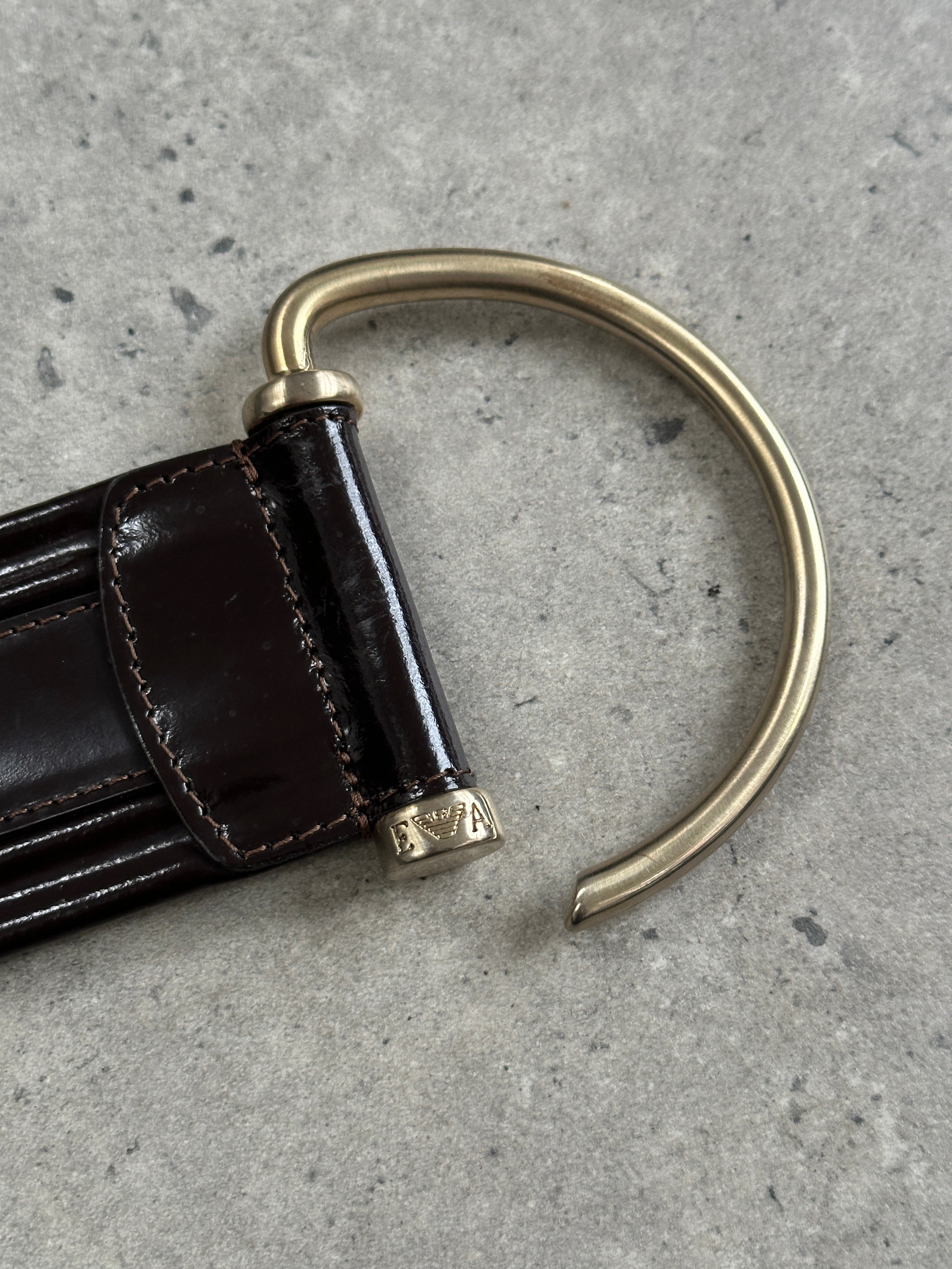 Emporio Armani leather D-ring belt in black, size W32-36, featuring a classic metal D-ring buckle and sleek design.