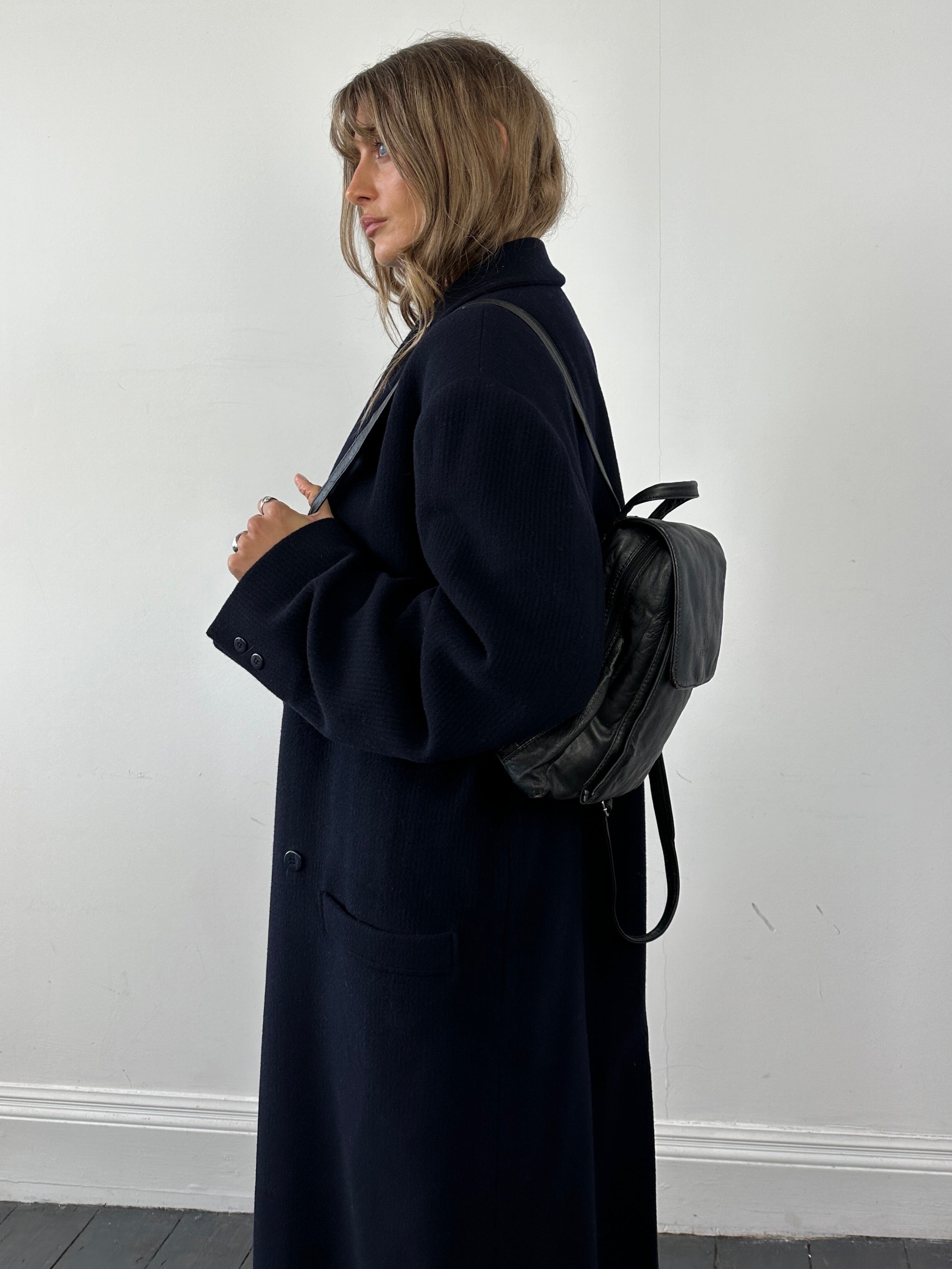 Versace wool cashmere double-breasted coat in XL, featuring a classic design with tailored lapels and stylish buttons.