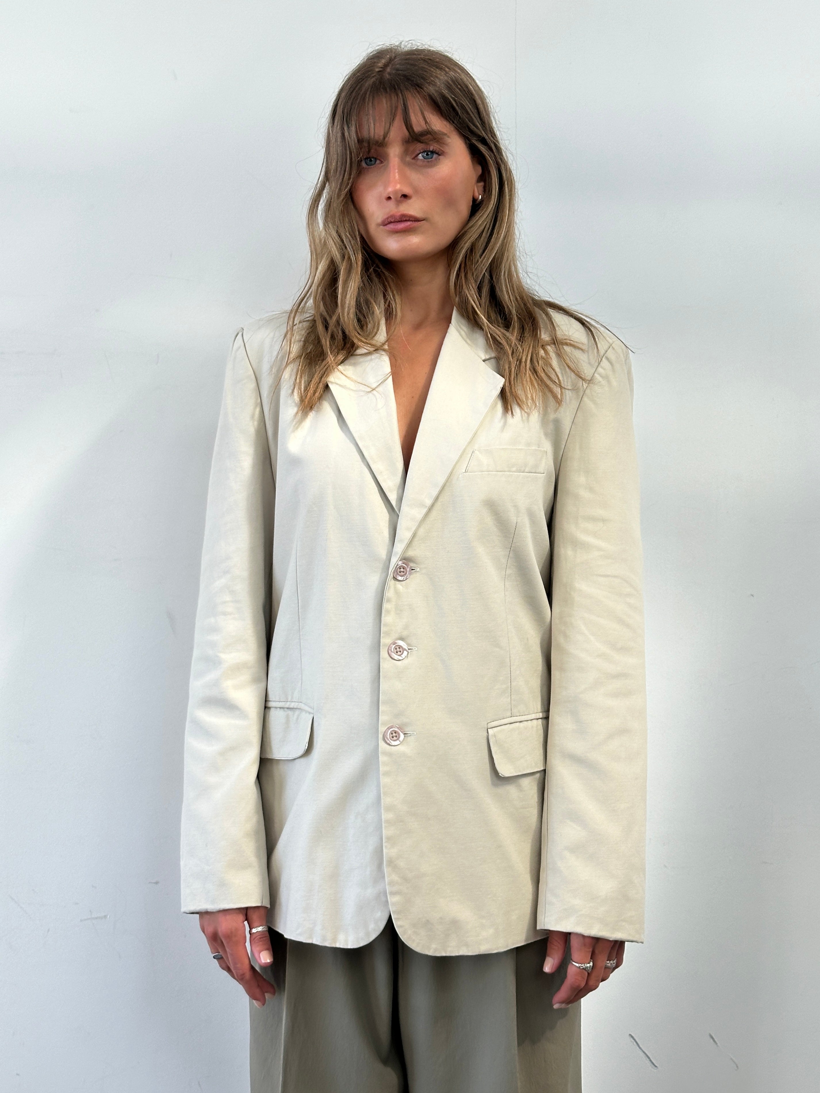 Vintage cotton single-breasted blazer in size L, showcasing classic design with lapels and button closure in a neutral color.