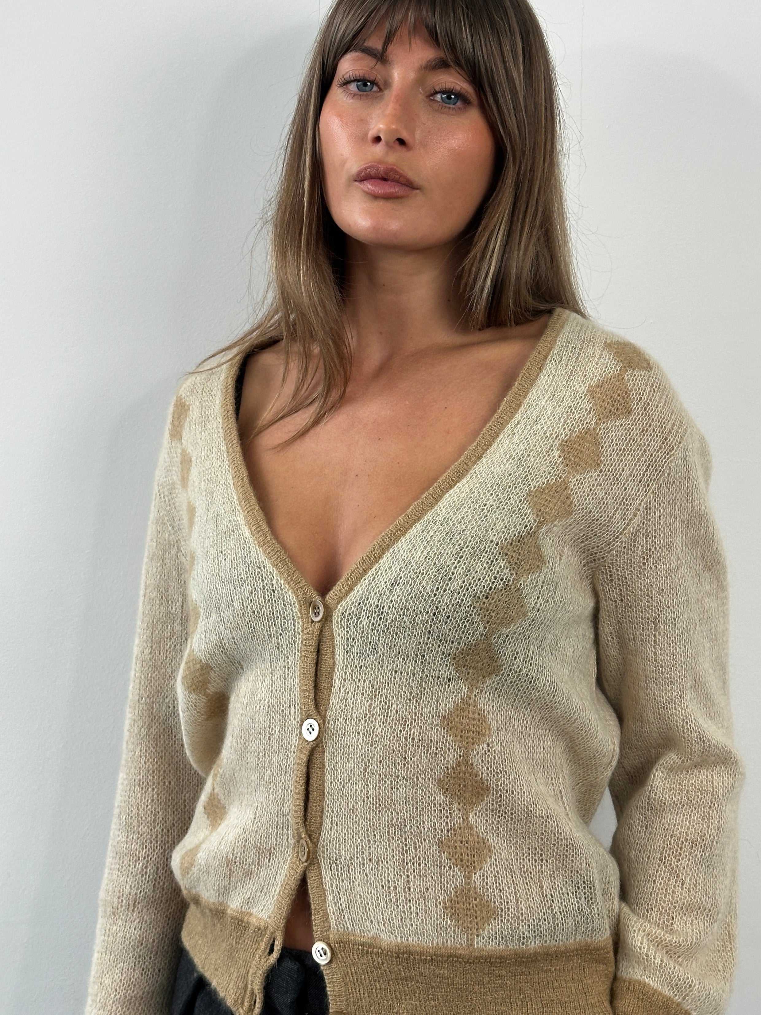 Vintage Italian 1980s mohair cardigan in S/M, featuring soft textured knit and classic design, perfect for retro fashion.