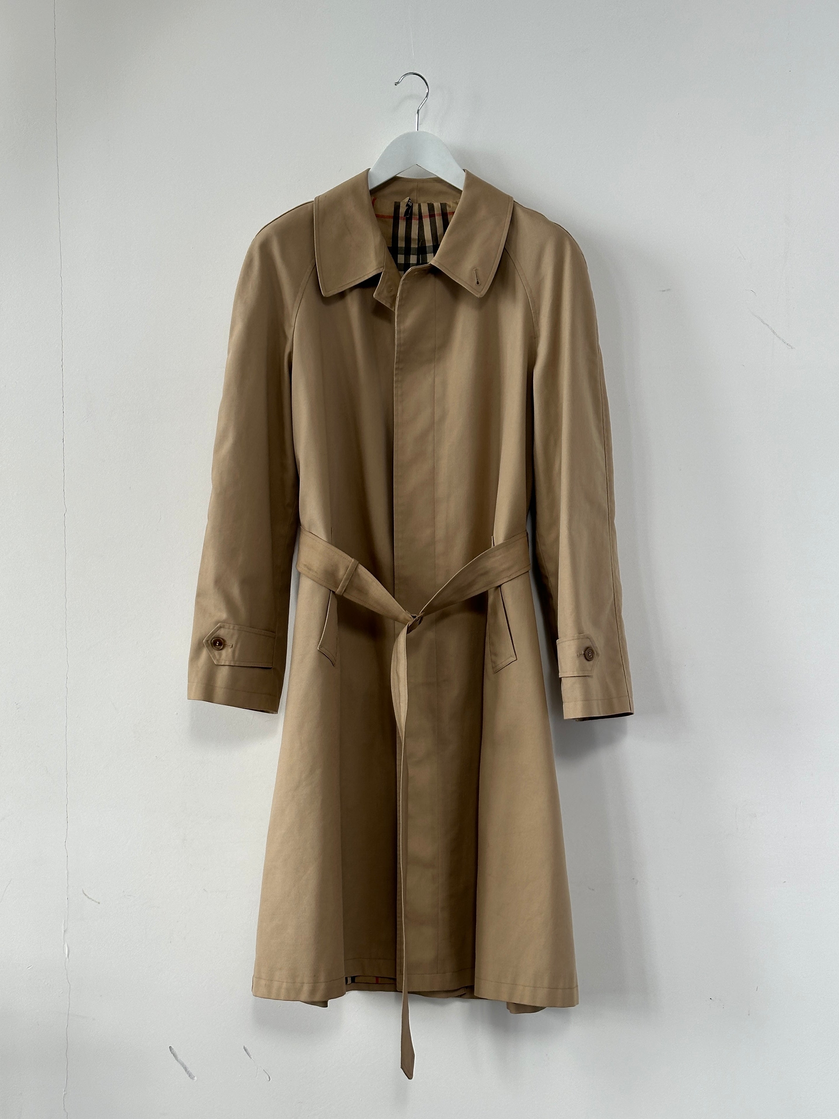 Vintage cotton belted trench coat in XL, featuring classic design and beige color, displayed on a hanger.