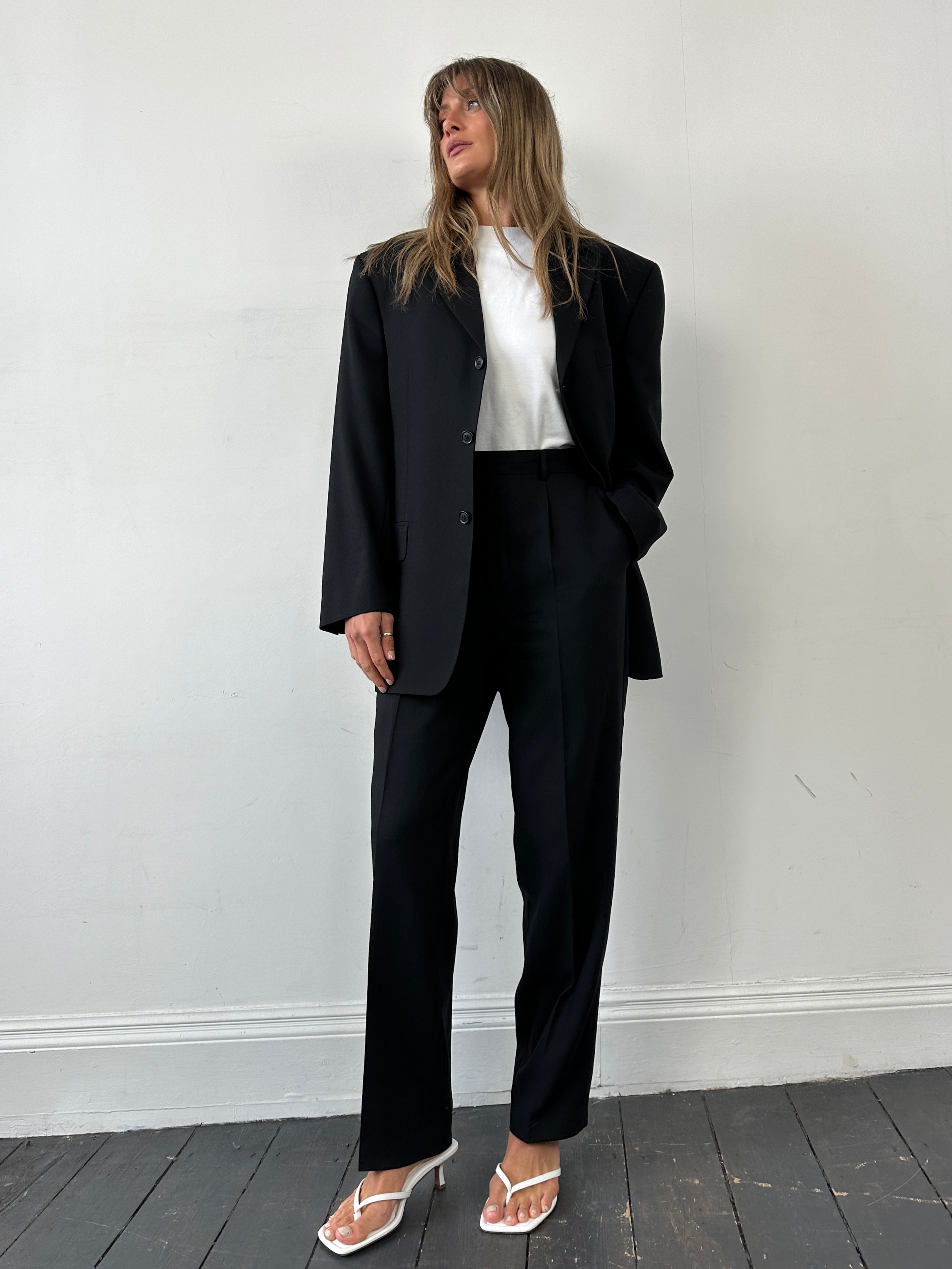 Pierre Cardin pure wool single-breasted jumpsuit in size 40R/W34, featuring tailored fit and classic style.