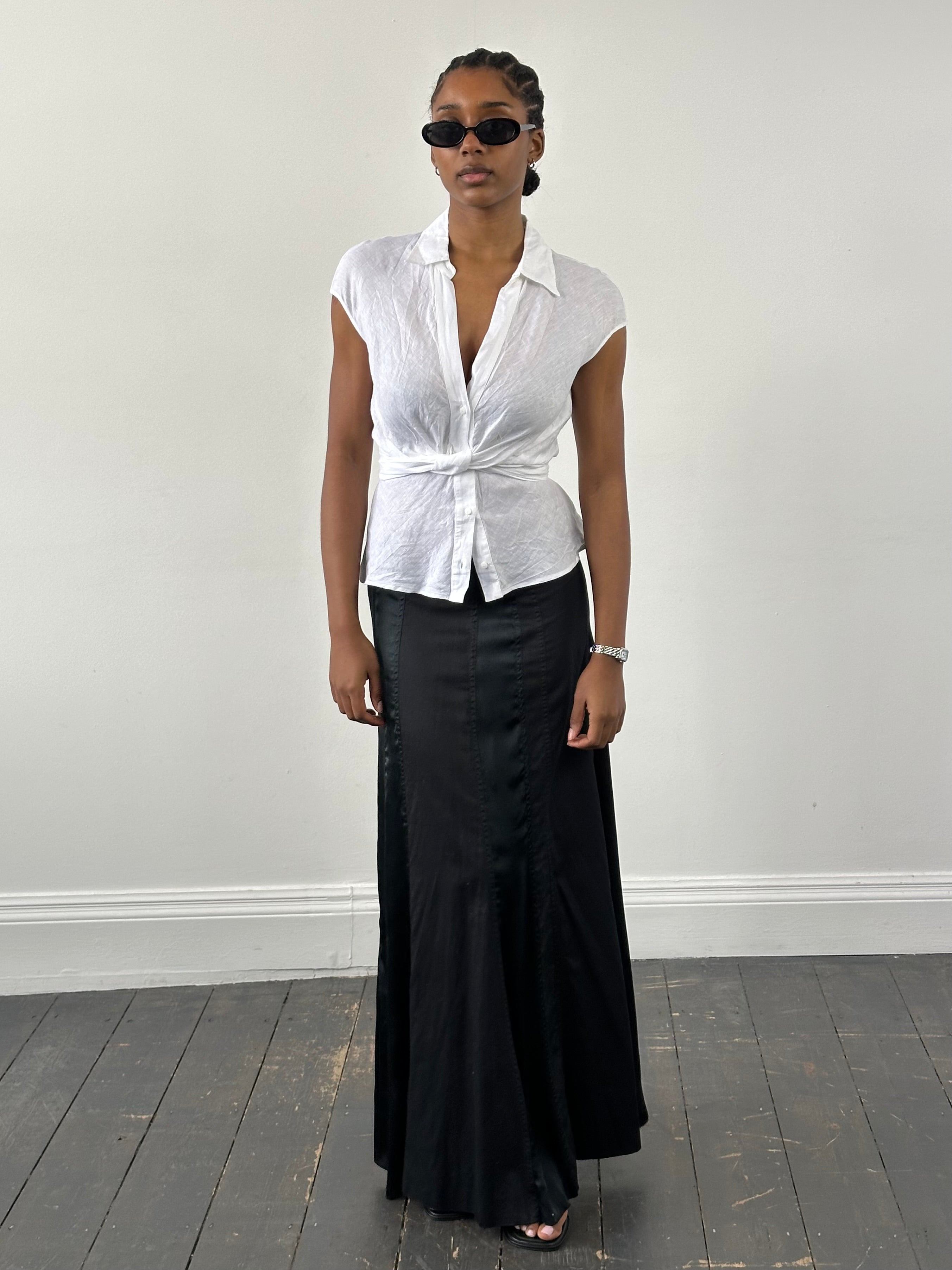 Vintage DKNY 2000s cotton panelled skirt, size W28, featuring a high-waisted design with color-blocked panels.