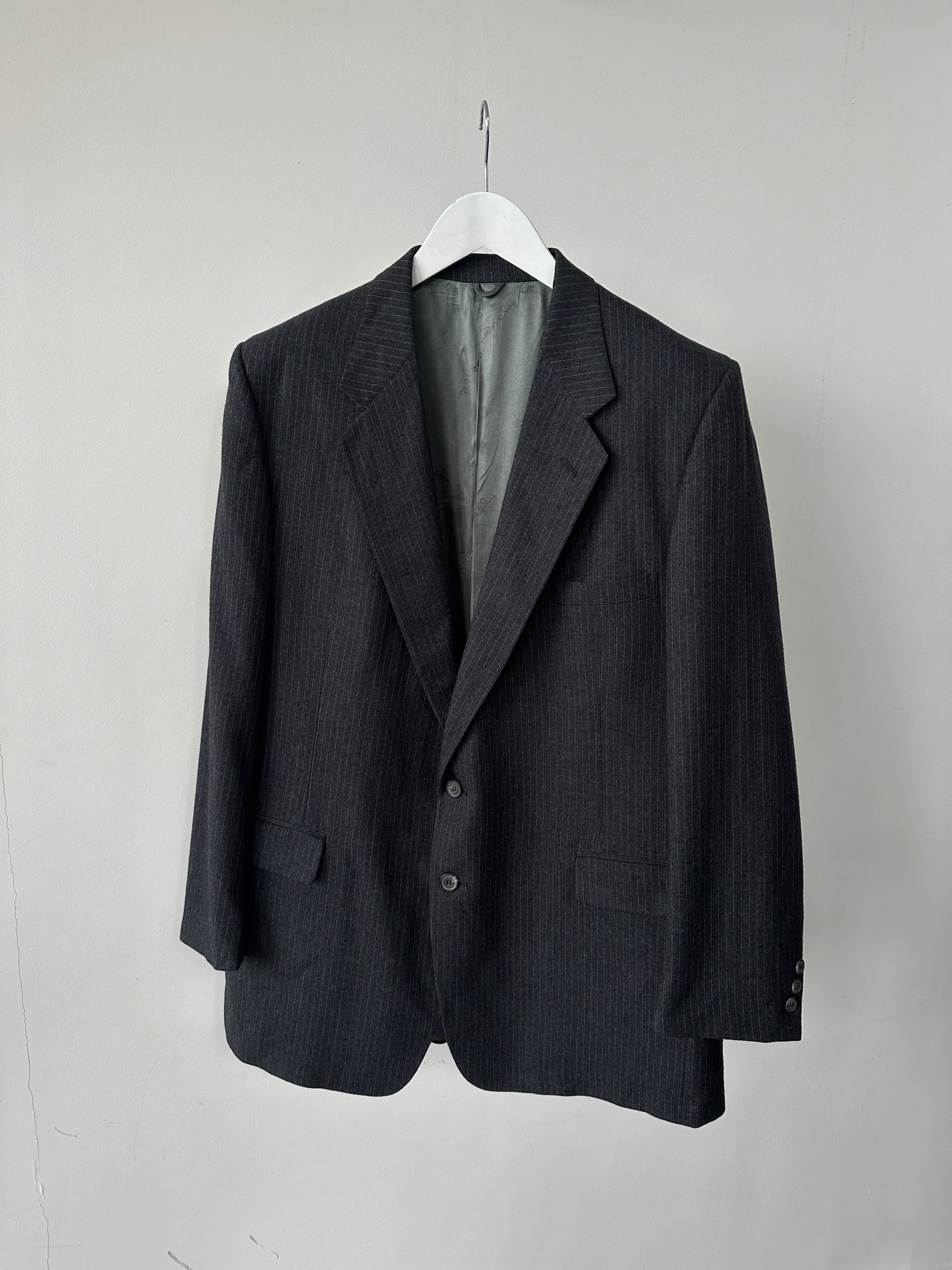 Givenchy pinstripe pure wool single-breasted blazer in size L/XL, tailored fit with classic lapel and front button closure.