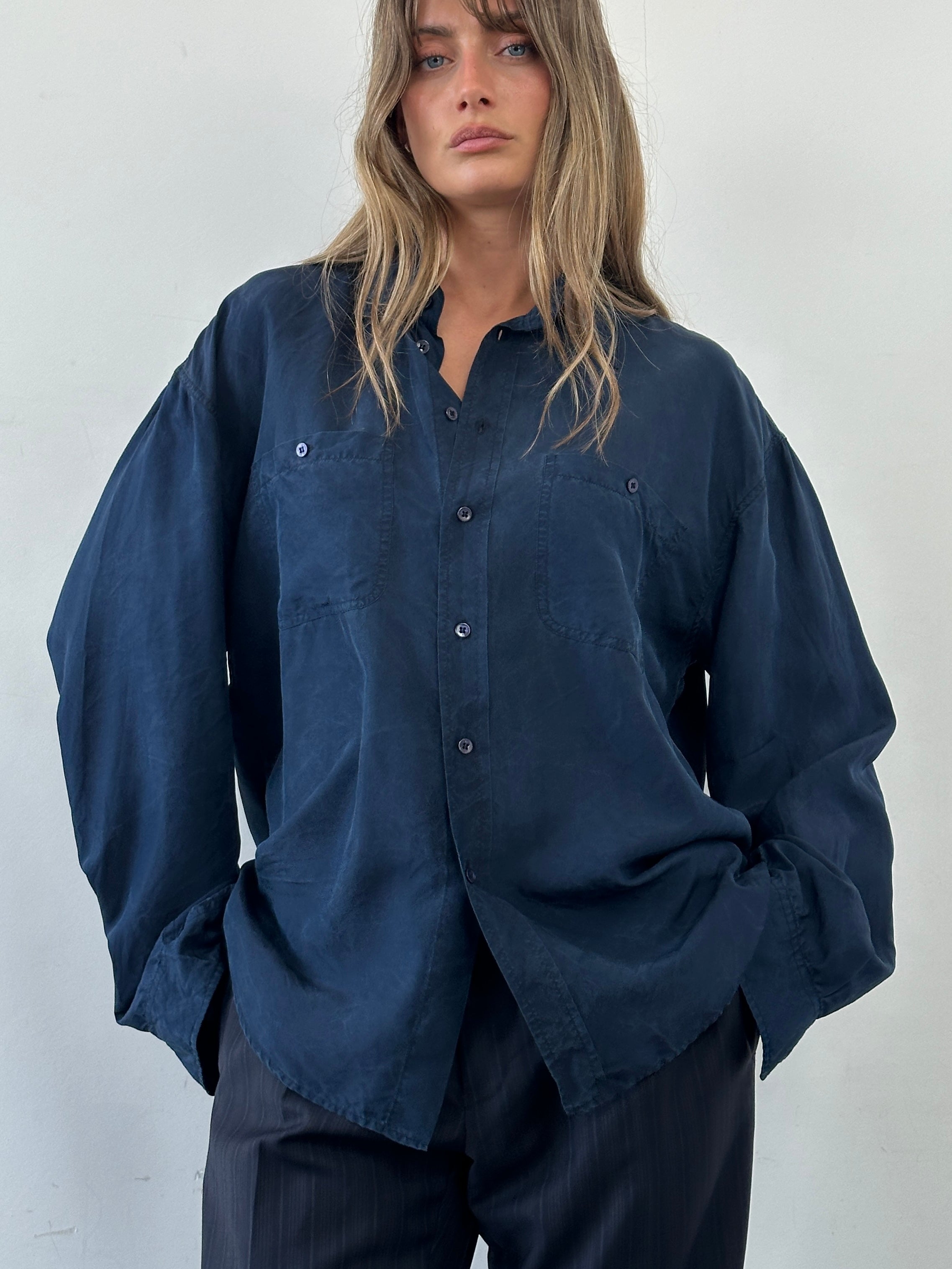 United Colors Of Benetton 90s relaxed pure silk shirt in XL, draped on a mannequin, showcasing smooth fabric and classic design.