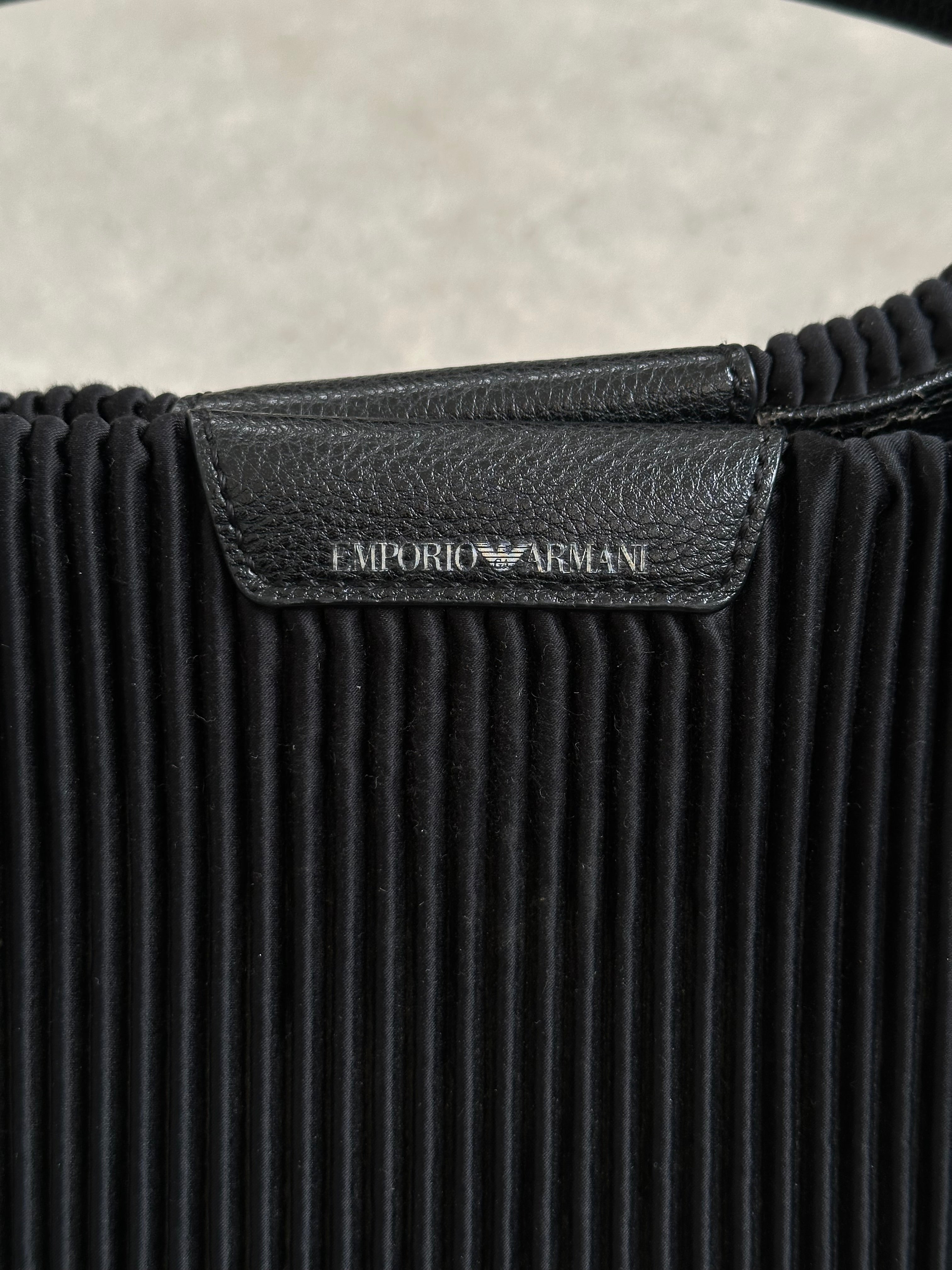 Emporio Armani pleated shoulder bag with structured design and metallic hardware, featuring a stylish and versatile accessory for any look.