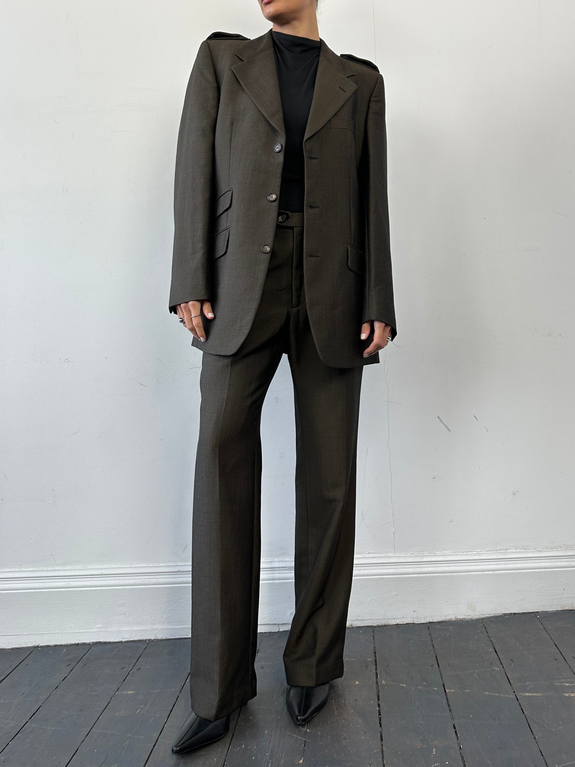 Gucci wool mohair single-breasted jumpsuit in size 40L/W30, featuring tailored fit and elegant design.