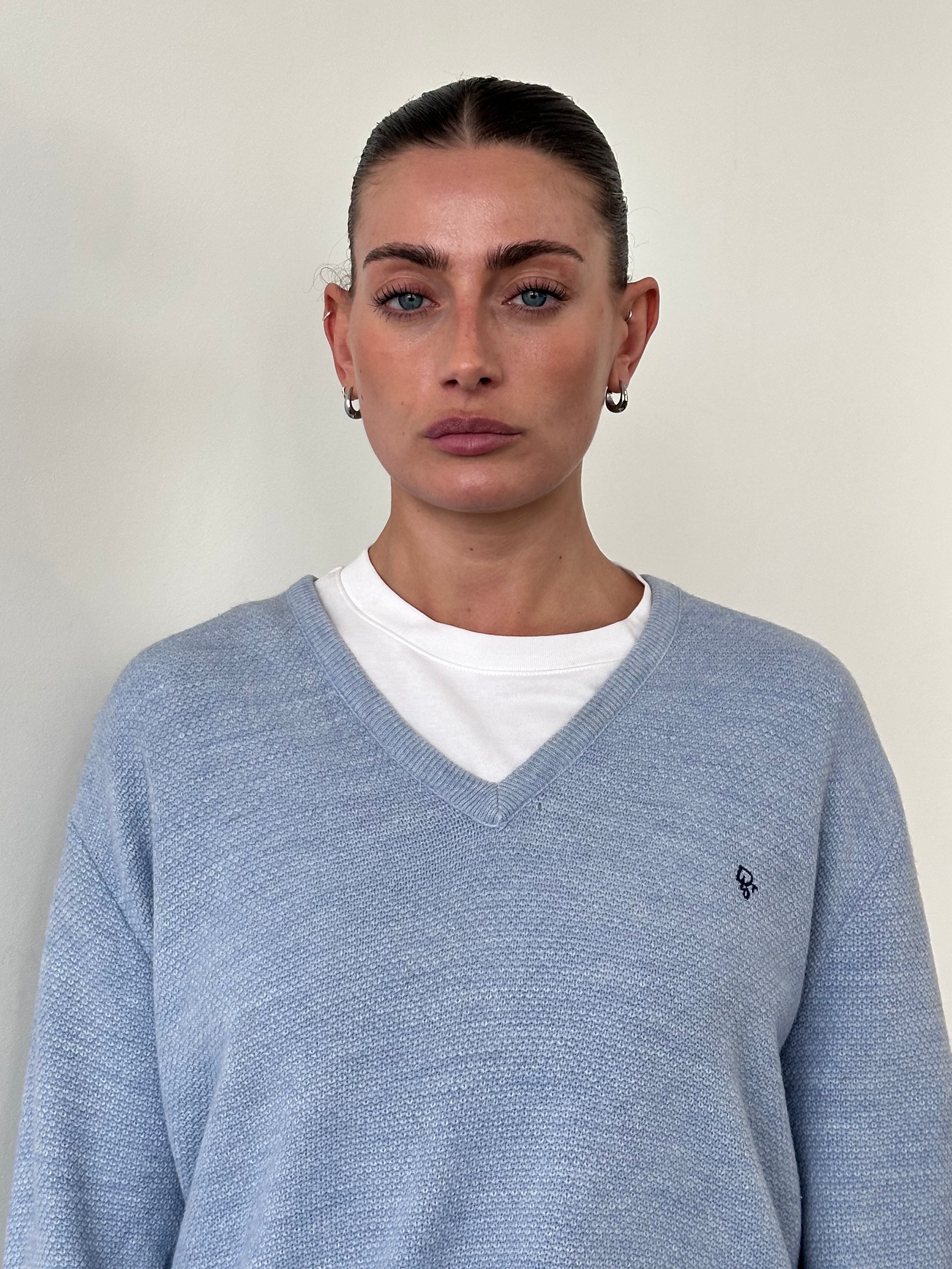 Christian Dior Monsieur V neck logo knitted jumper in size L/XL, featuring a stylish V neckline and Dior branding.