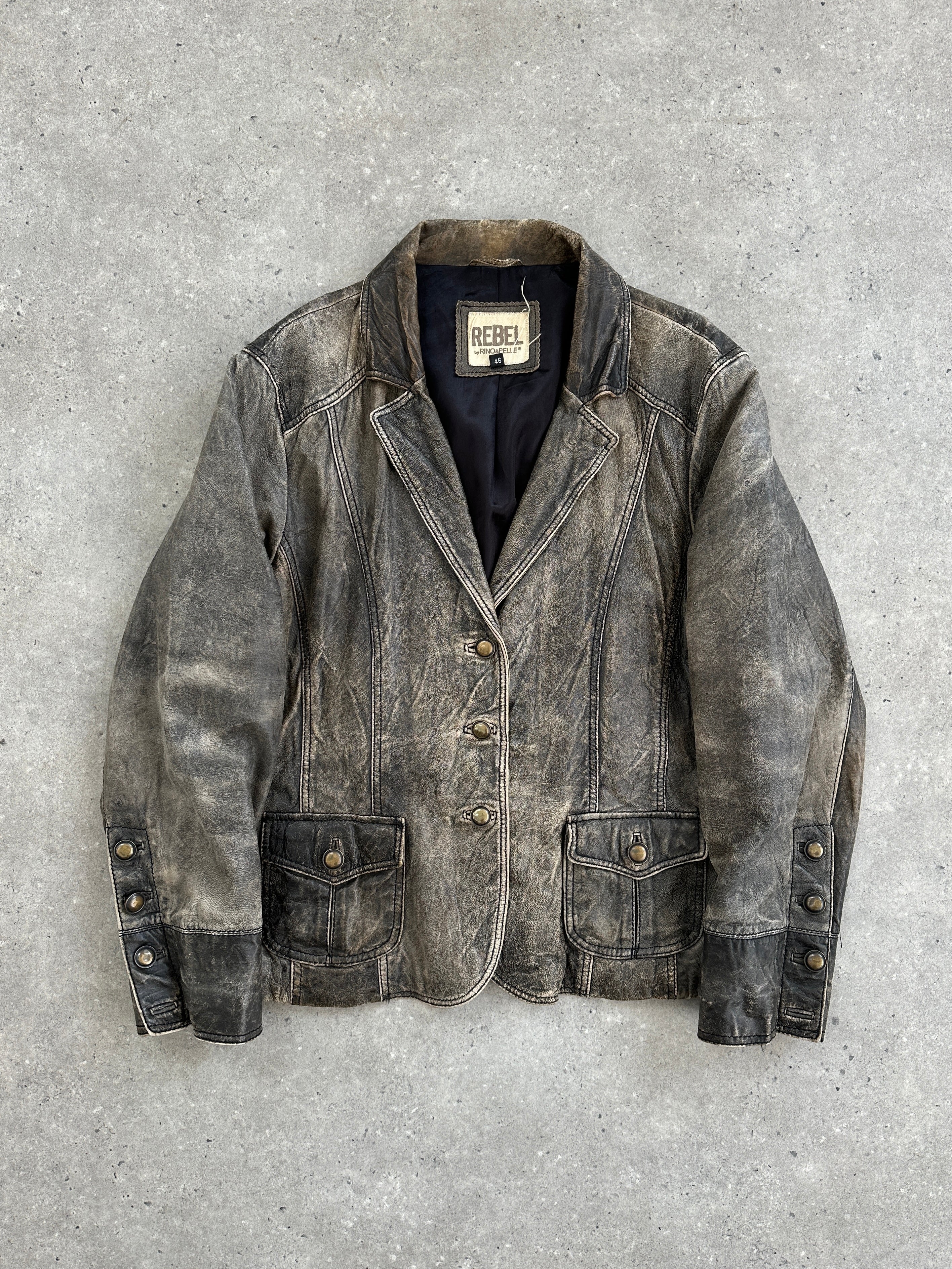 Vintage aged leather blazer jacket in size M, featuring a classic design with a worn-in, stylish appearance.