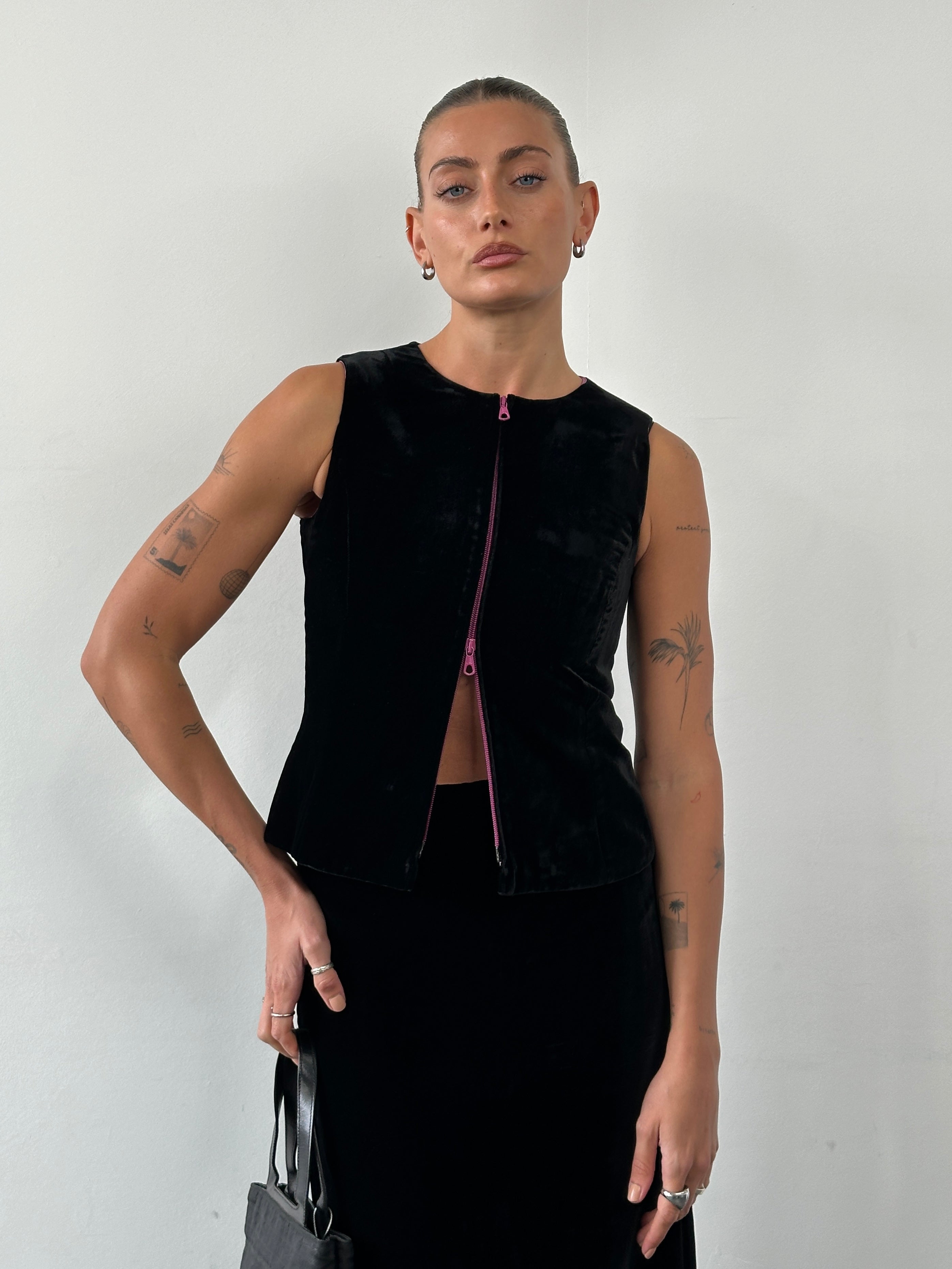 Giorgio Armani velvet two-piece skirt set from Le Collezioni, 1980s, featuring a matching skirt and top in rich velvet fabric.