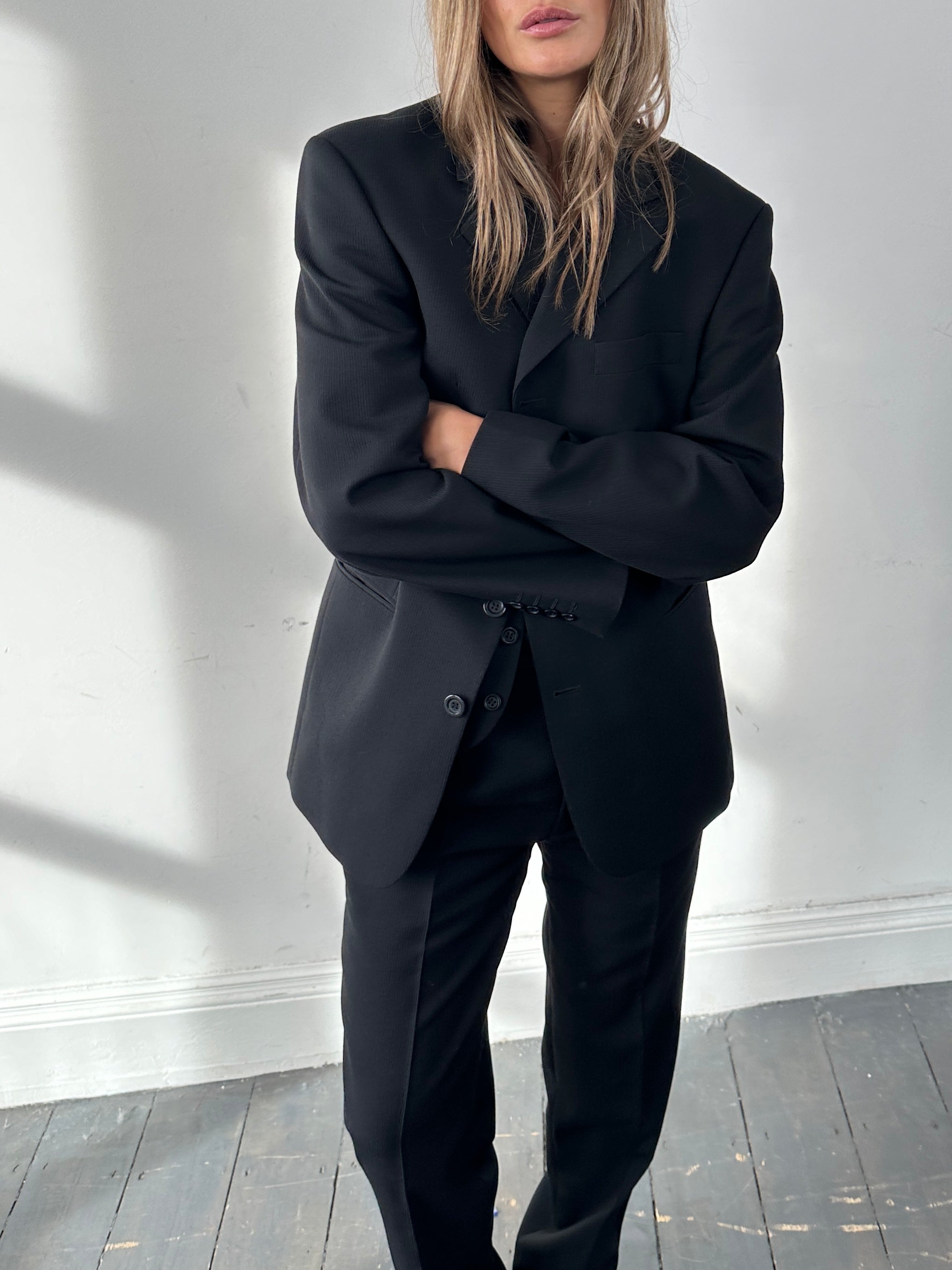 Vintage wool ribbed three-piece suit, size 38R, featuring a tailored jacket, waistcoat, and trousers in classic style.