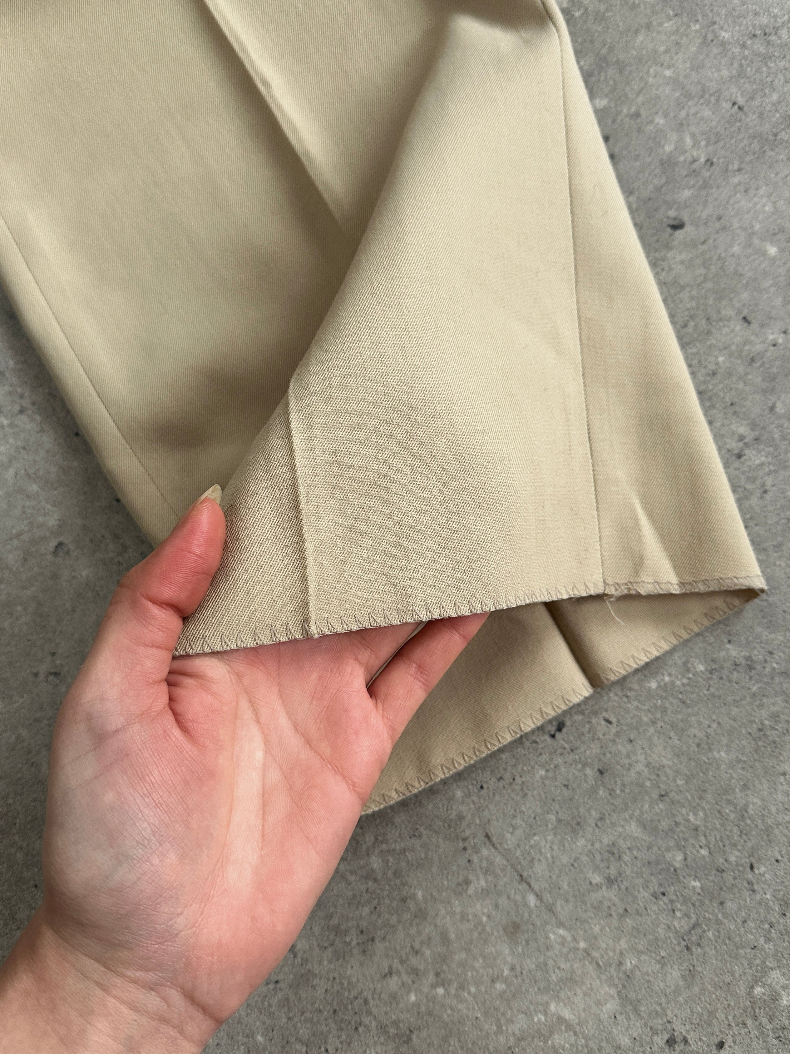 Vintage mid-rise straight leg tailored trousers in W28, featuring classic design and neutral fabric in a stylish, versatile fit.