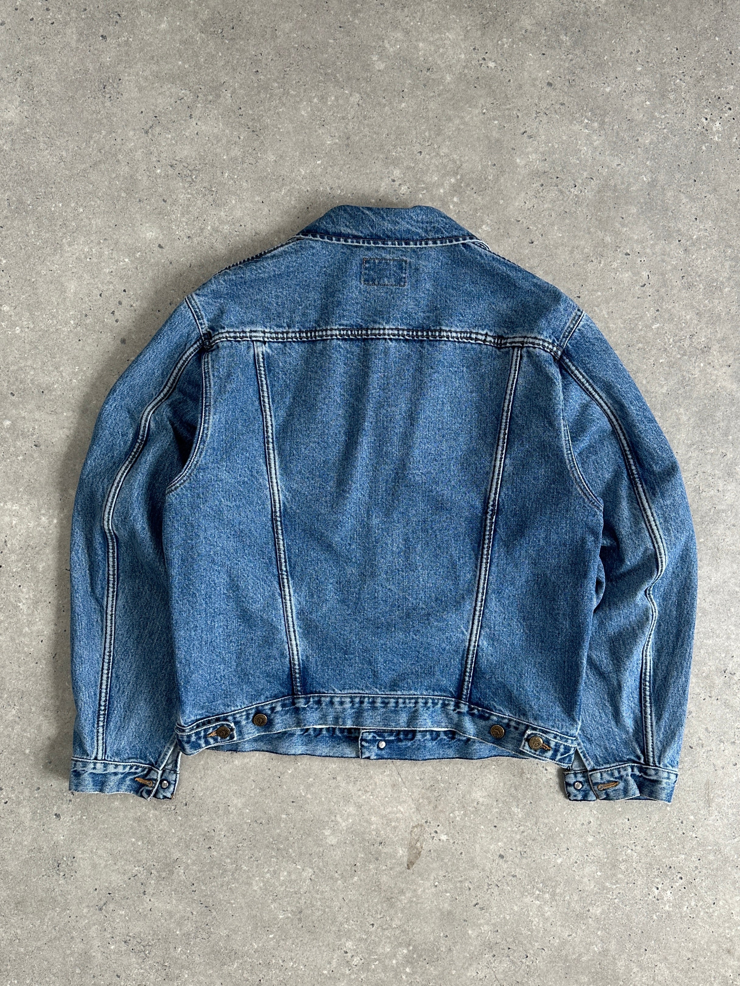 Armani Jeans mid wash denim jacket in size L, featuring classic style with button closure and chest pockets.