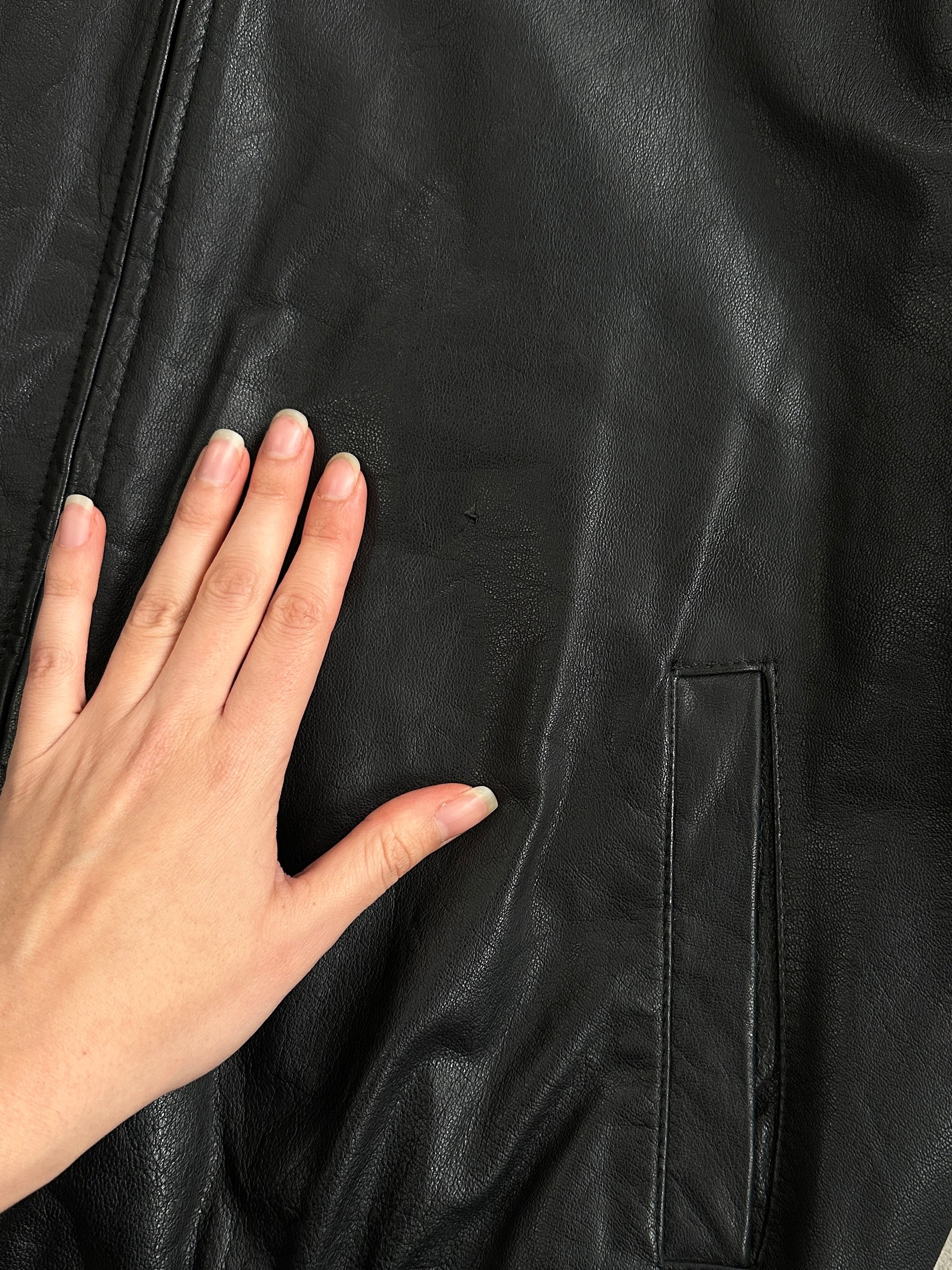 Vintage 1980s high neck leather bomber jacket, men's size L, classic black leather with a structured collar and vintage style.