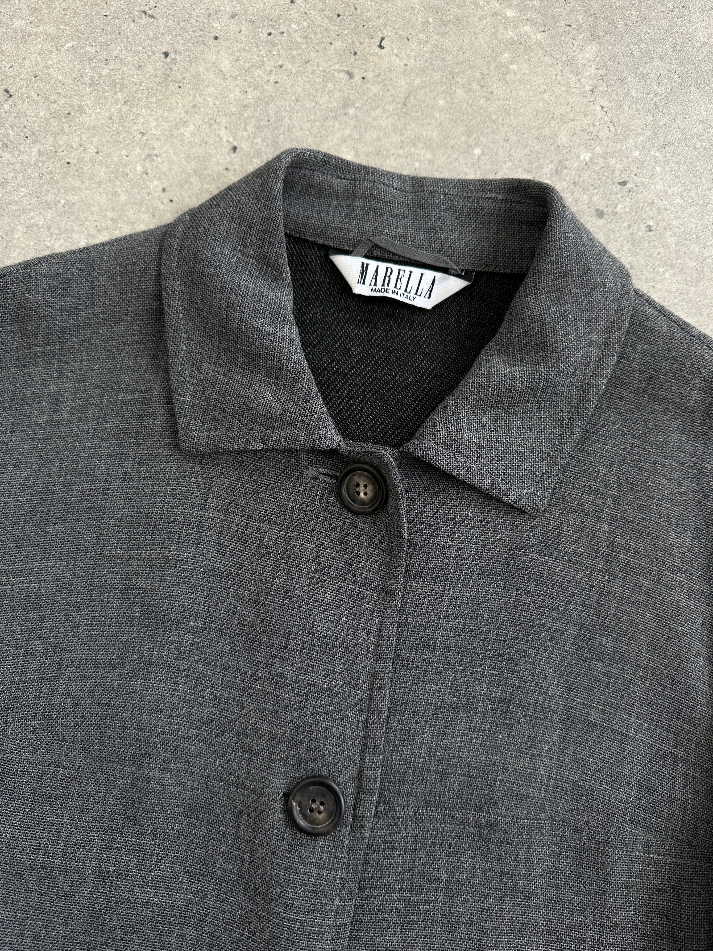 Marella minimal wool lightweight jacket in size L, shown in a sleek, tailored design with a smooth fabric finish.