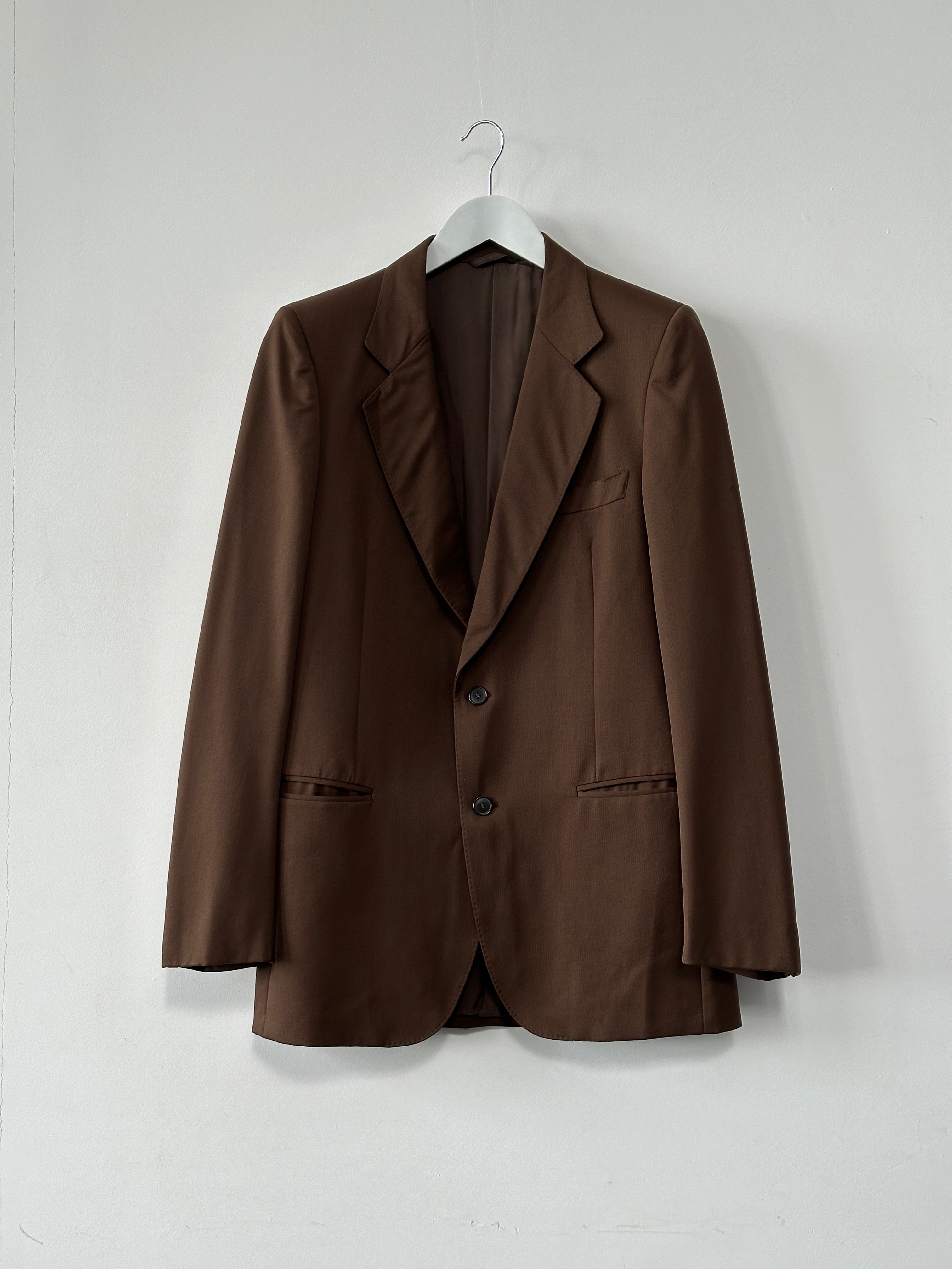Vintage Italian vintage pure wool single-breasted blazer in size S/M, showcasing classic tailored design and rich fabric texture.