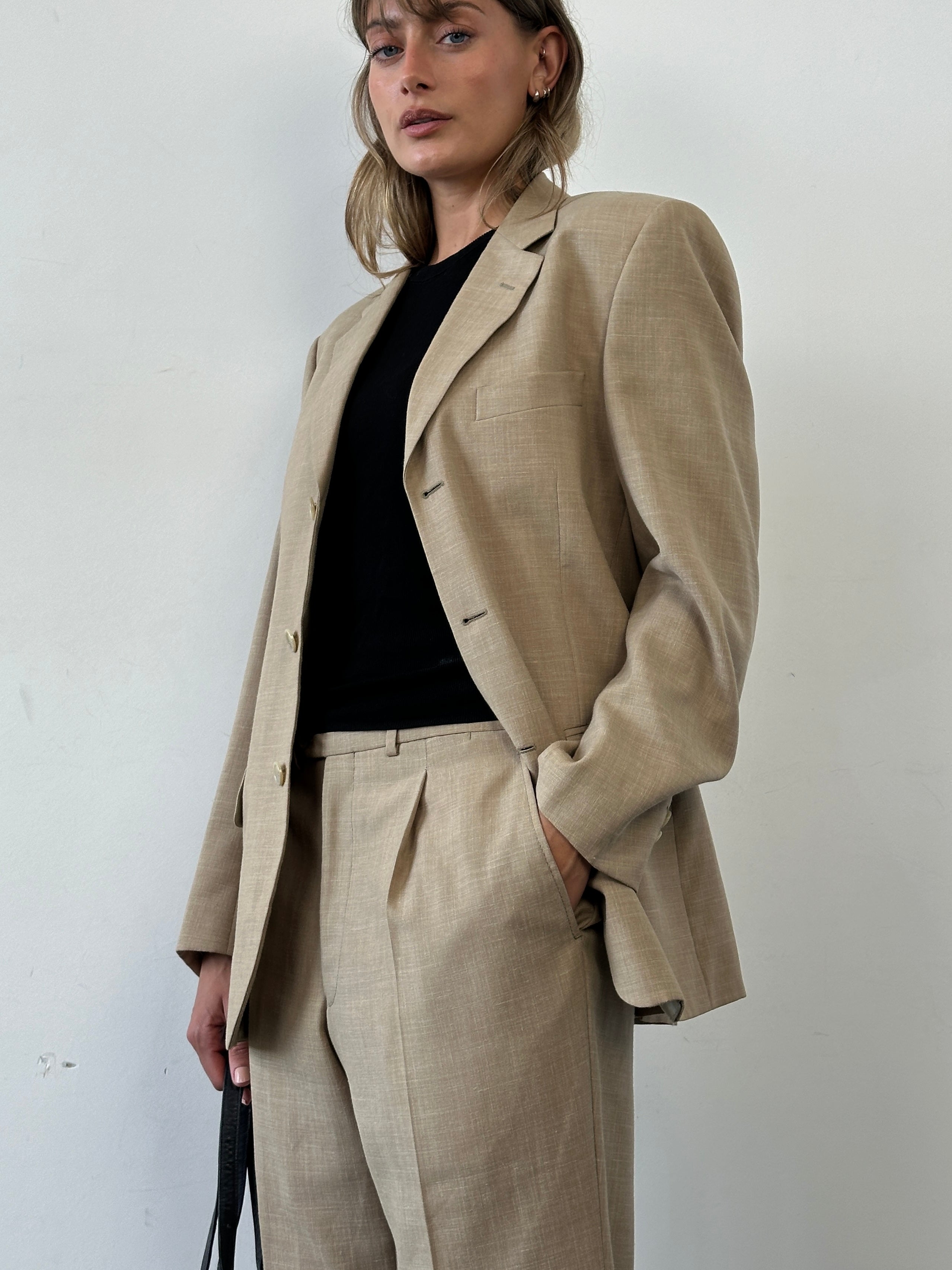 Vintage vintage single-breasted wool linen blend jumpsuit in size 36R/W31, featuring a classic tailored design.