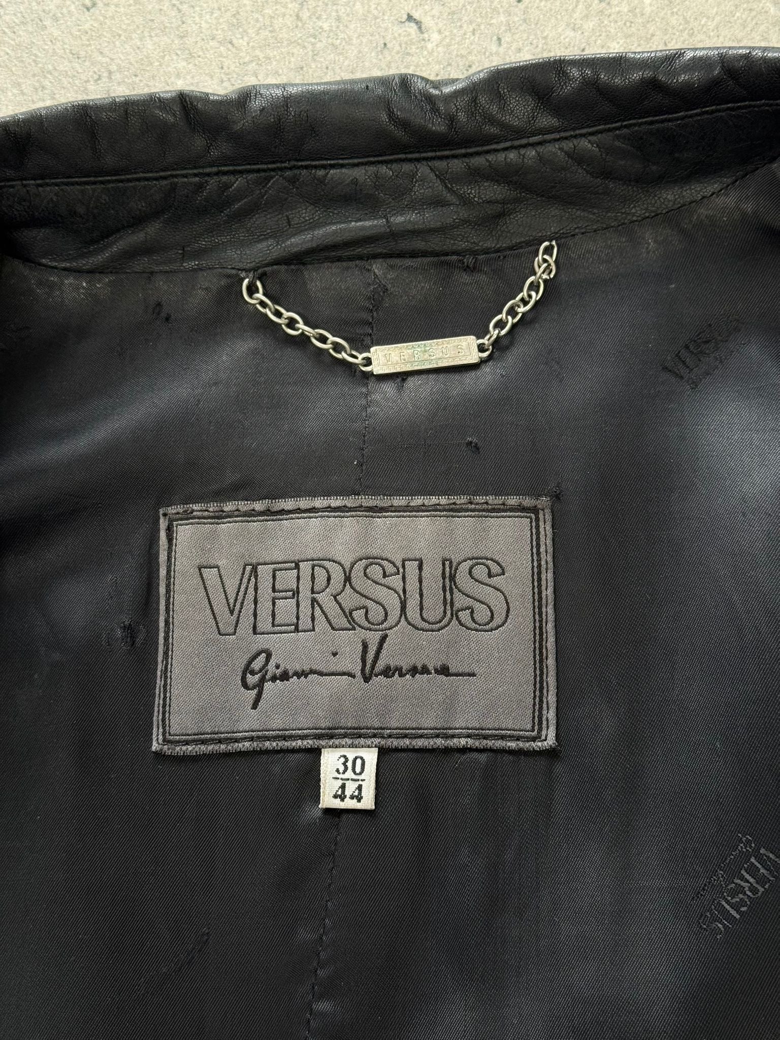 Gianni Versace Versus 1990s leather trench coat, black leather jacket with classic design, displayed on a hanger.
