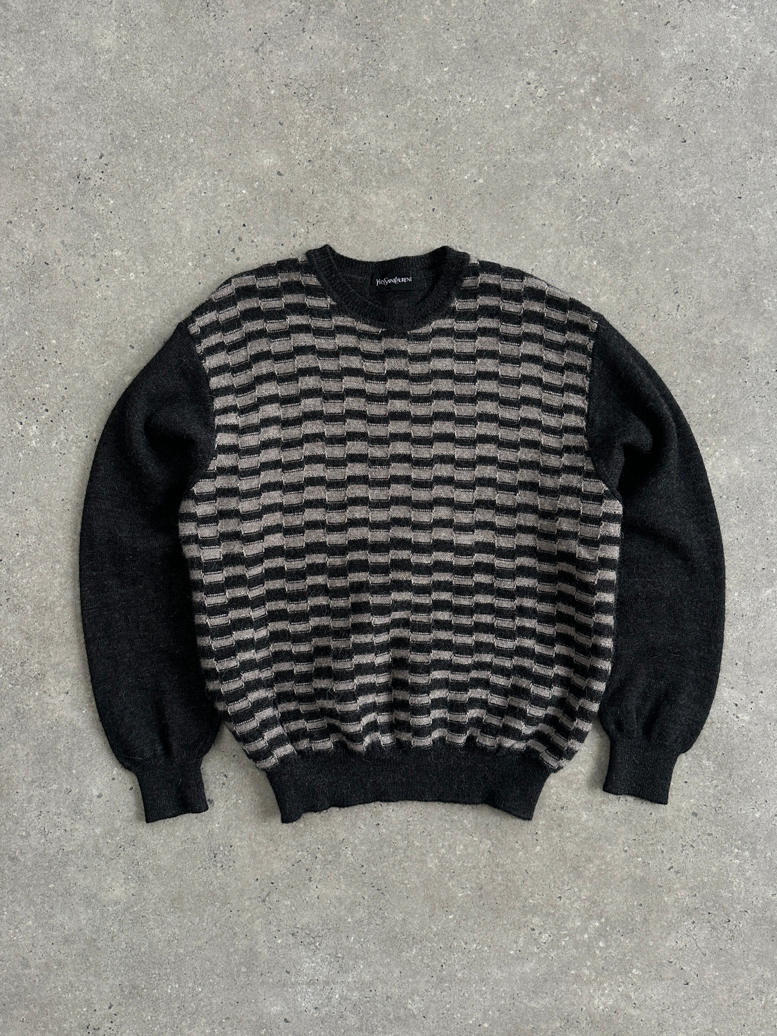 Yves Saint Laurent wool and alpaca knitted jumper in M/L, featuring a cozy, textured design and ribbed cuffs and hem.
