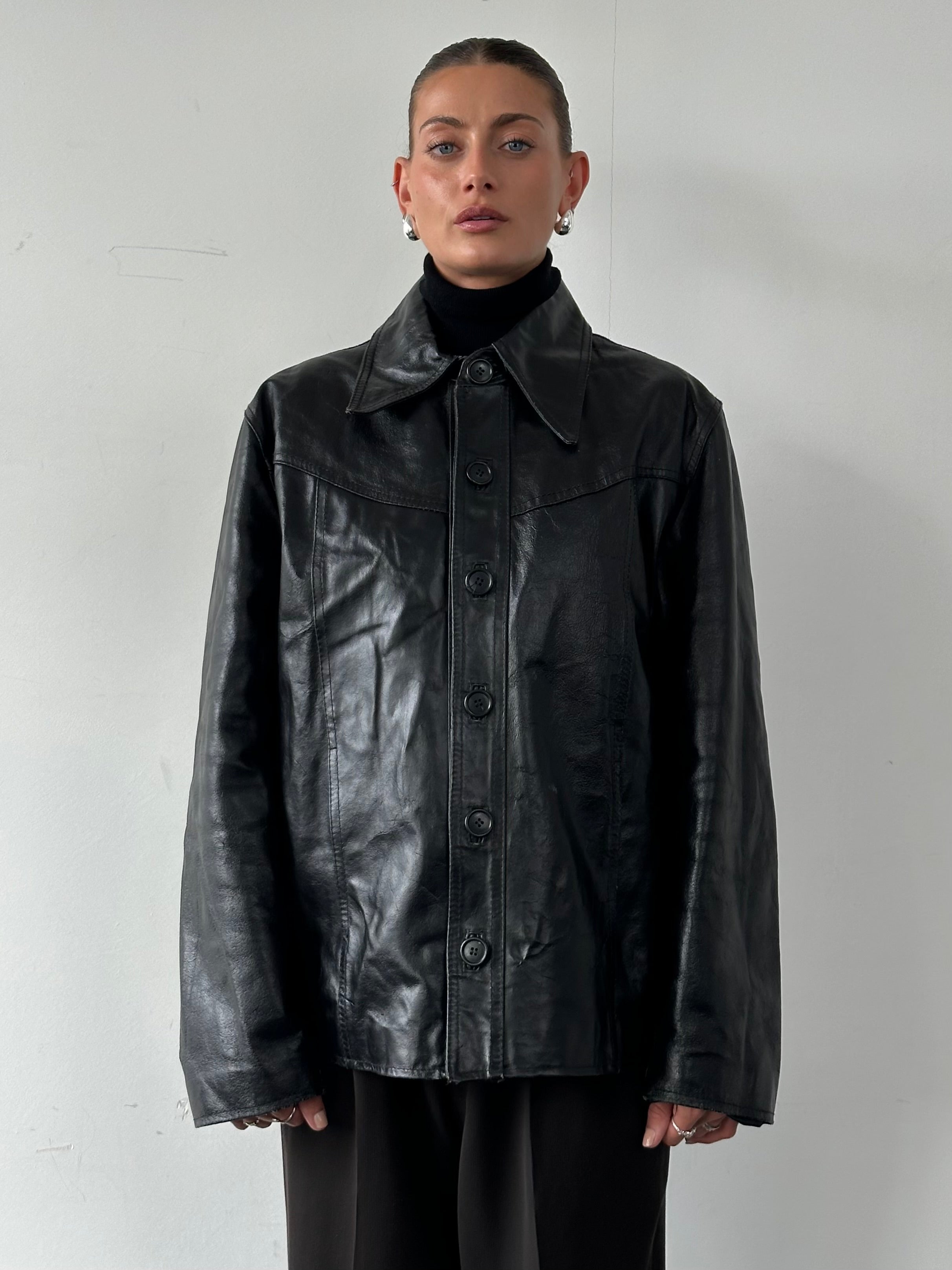 Vintage Italian vintage leather jacket with dagger collar, size large, featuring distressed brown leather and stylish detailing.