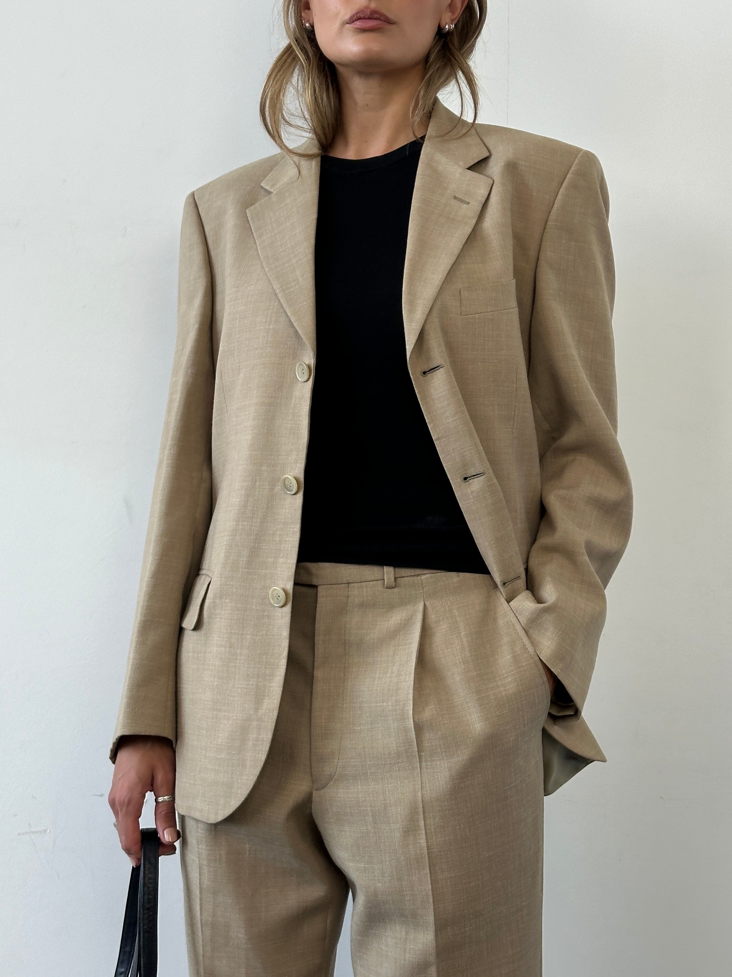 Vintage single-breasted wool linen blend suit jumpsuit in size 36R/W31, featuring a classic tailored fit and vintage style.