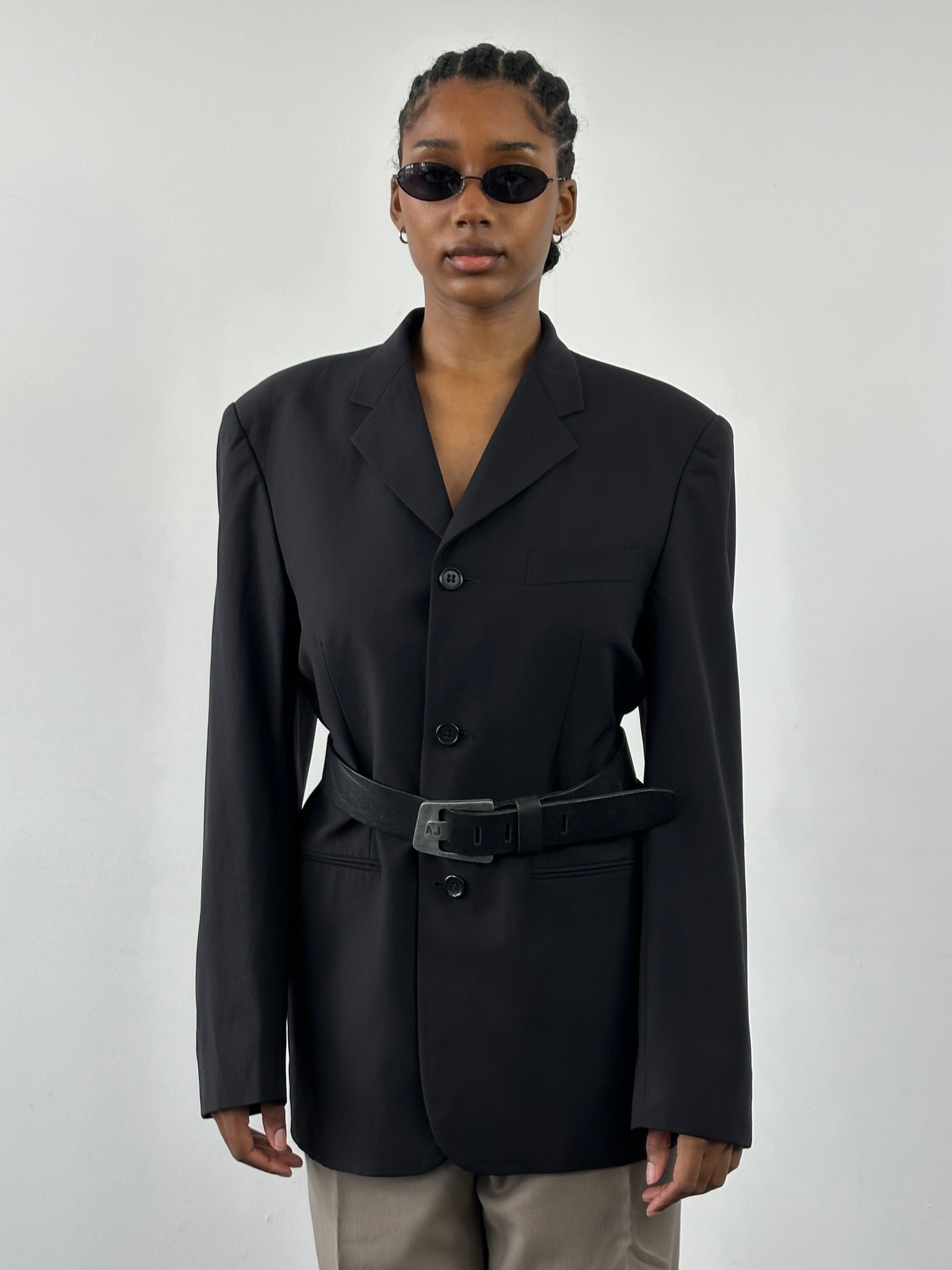Yves Saint Laurent Pour Homme 1990s pure wool blazer in size 40R/L, tailored fit with classic lapel and button closure.