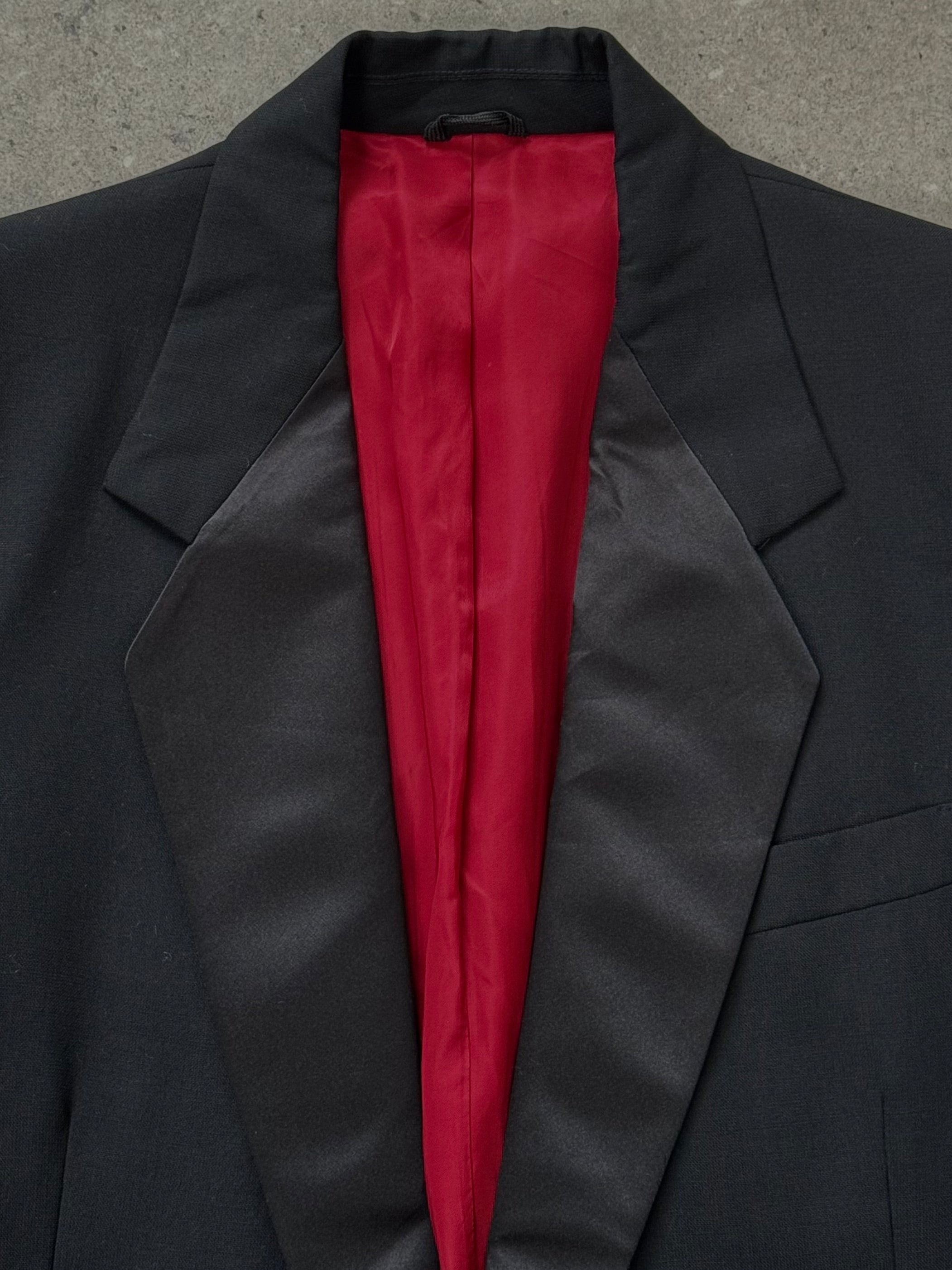 Yves Saint Laurent 1990s pure wool tuxedo blazer in size 38R/M, tailored fit with classic black lapels and sleek design.