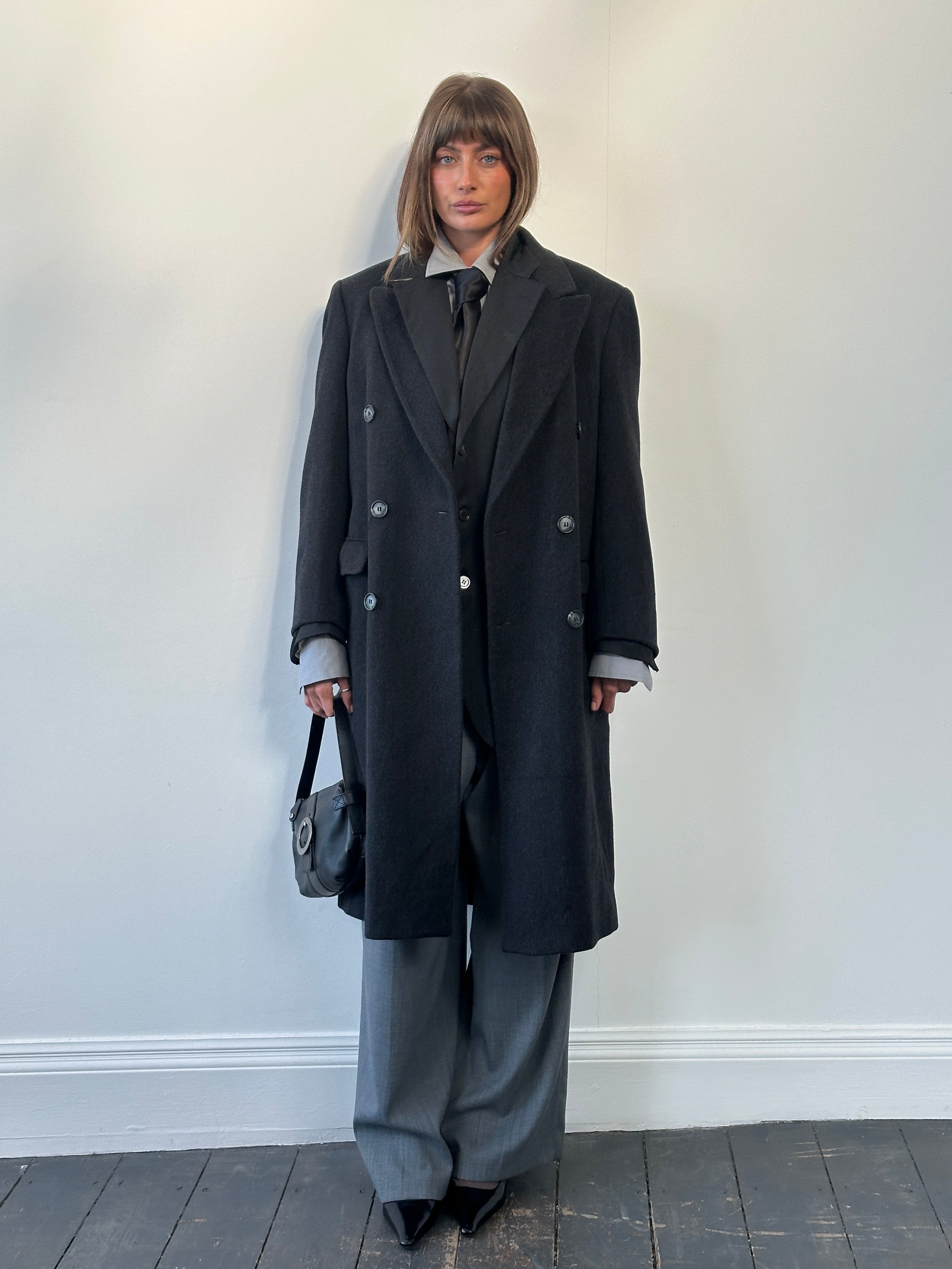 Vintage 1980s pure wool double-breasted coat in size L, featuring classic design and tailored fit in a timeless style.