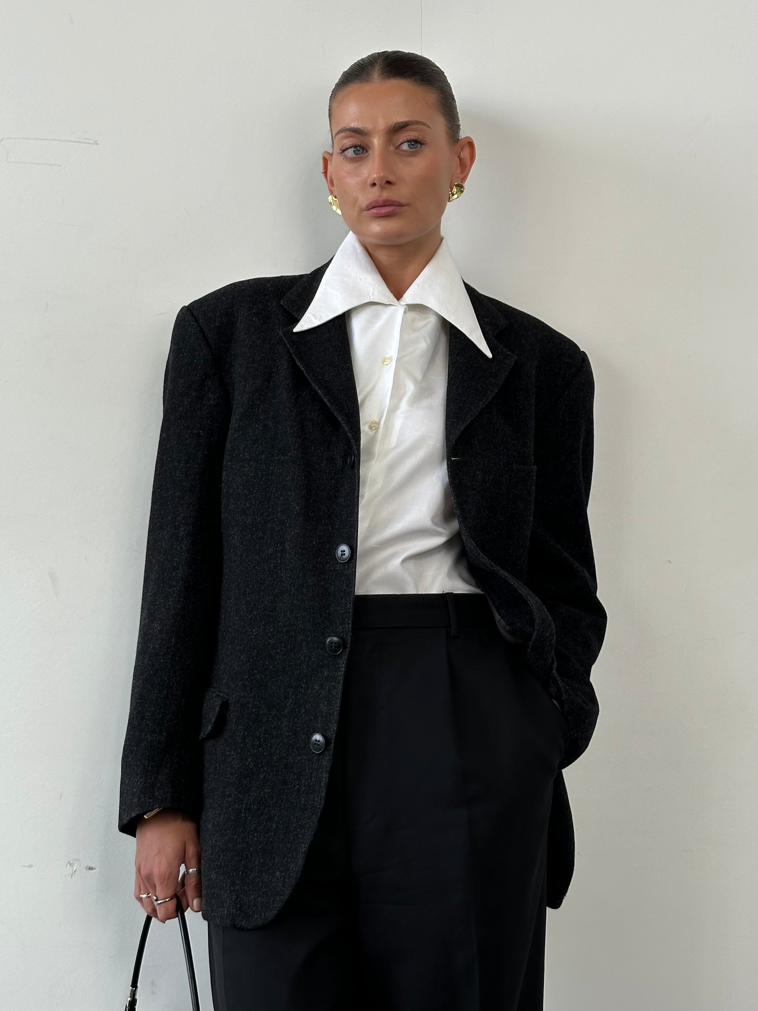 Vintage 1970s Dagger Collar Shirt in size S/M, featuring retro design with pointed collar and classic button-up style.