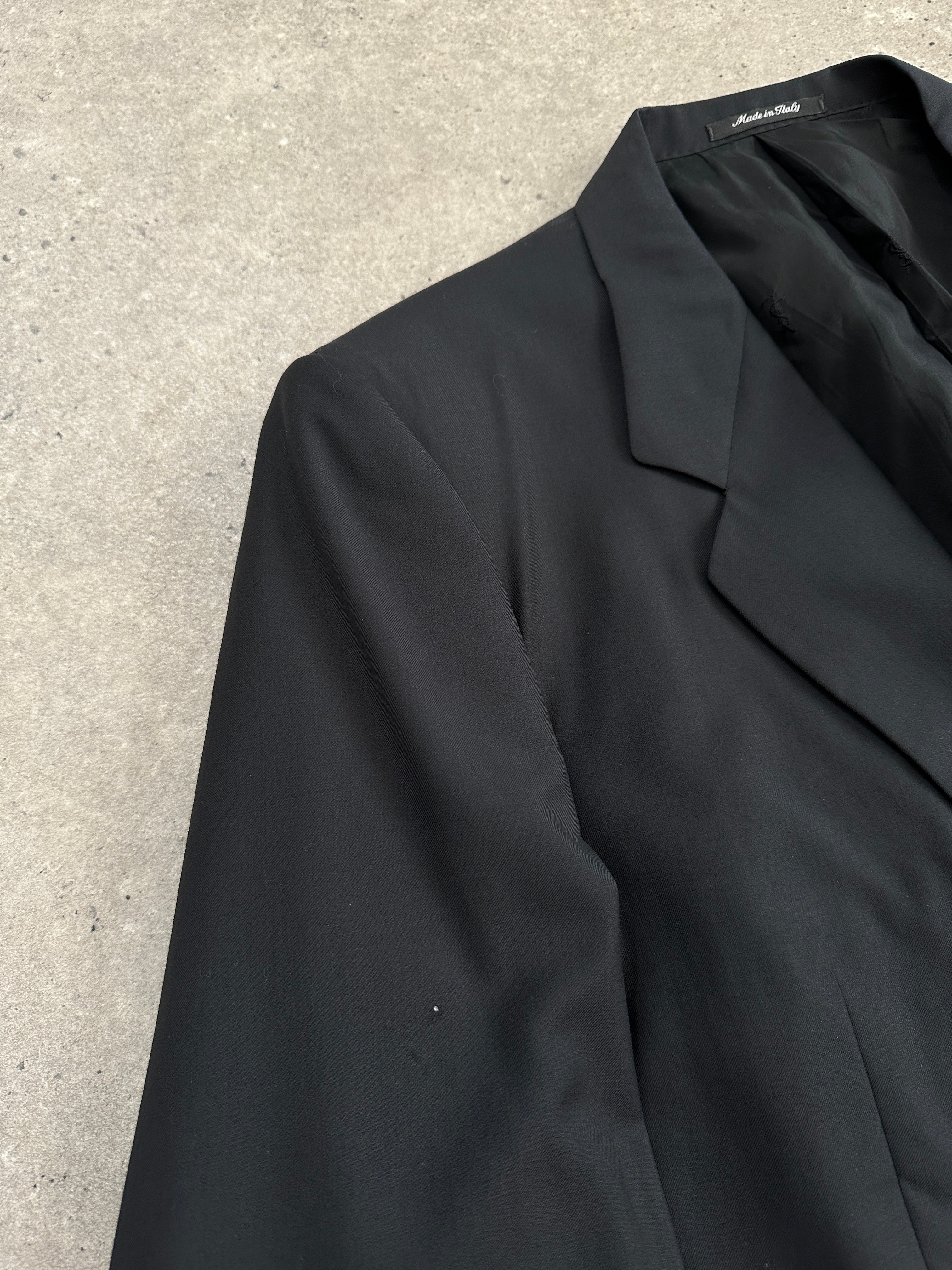 Yves Saint Laurent 70s wool single-breasted blazer in size 44R/XL, shown in classic design, tailored fit, and neutral color.