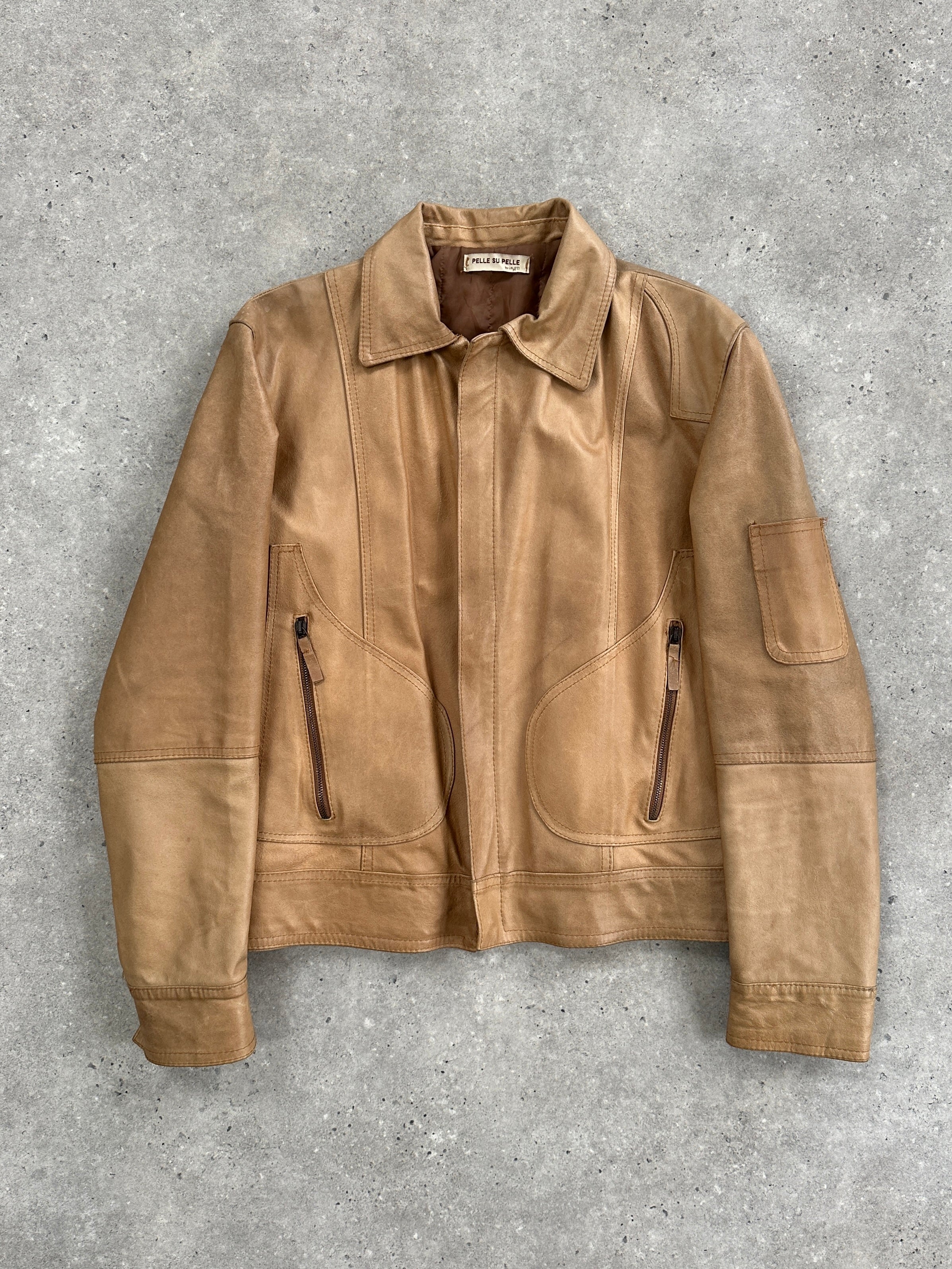 Italian vintage leather jacket in size M/L, featuring classic design and distressed leather from the Vintage brand.
