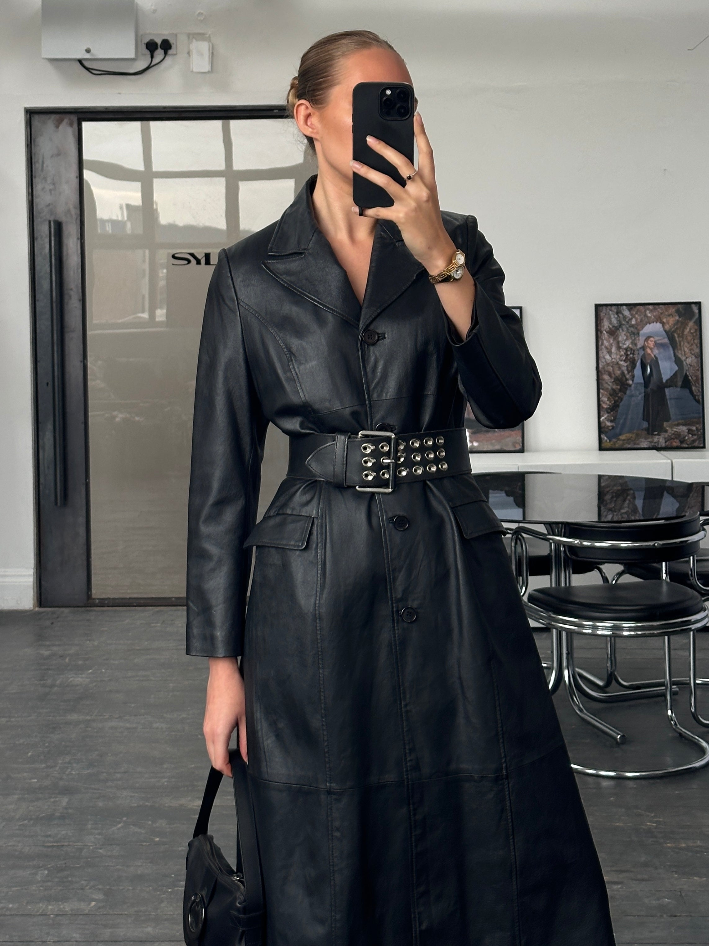 Vintage 1990s leather trench coat, floor length, S/M size, classic black leather jacket with tailored fit and vintage style.