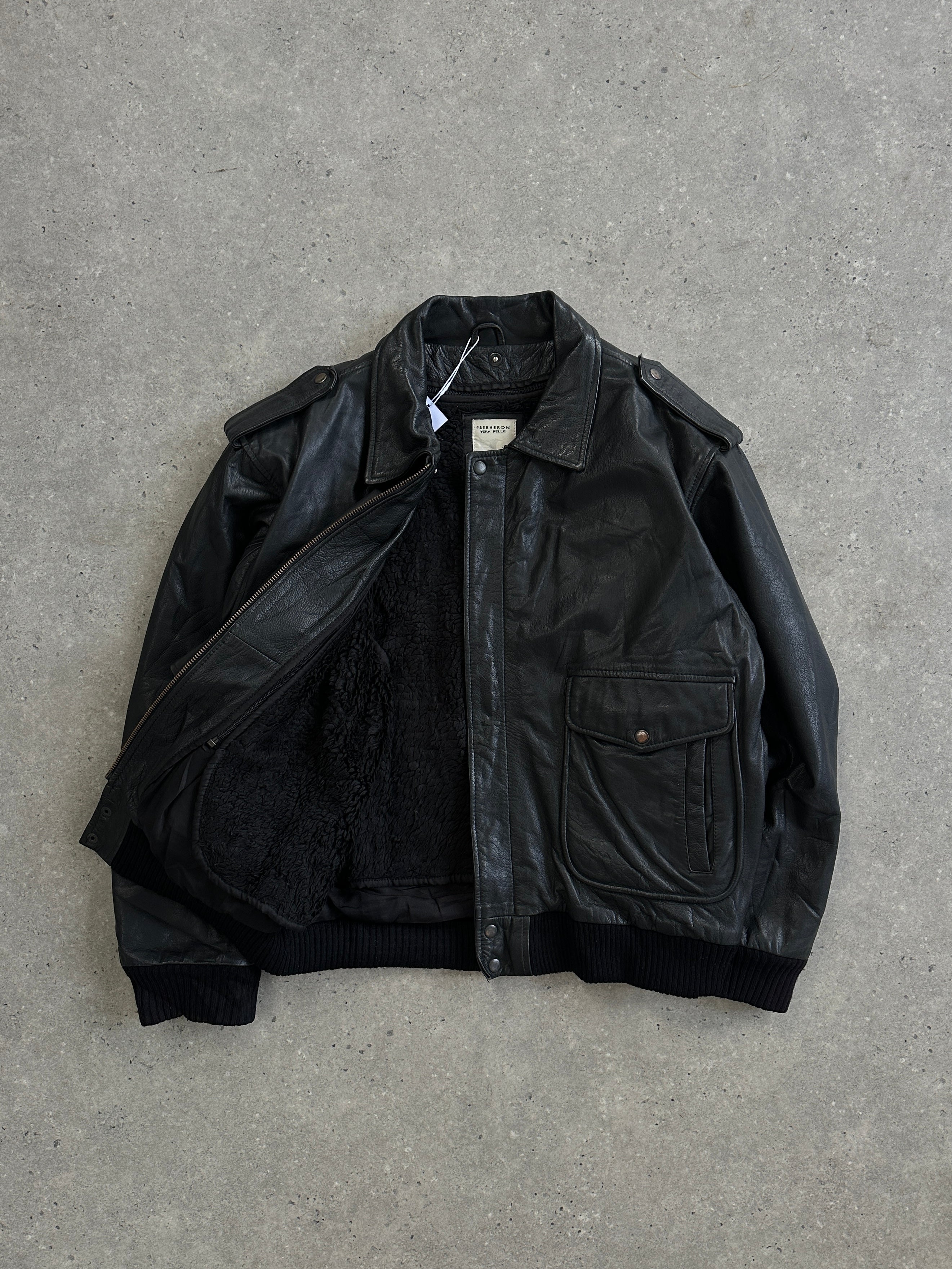 Conbipel leather bomber jacket with removable fleece lining, aviator style, in size L/XL, featuring a classic aviator design and leather details.