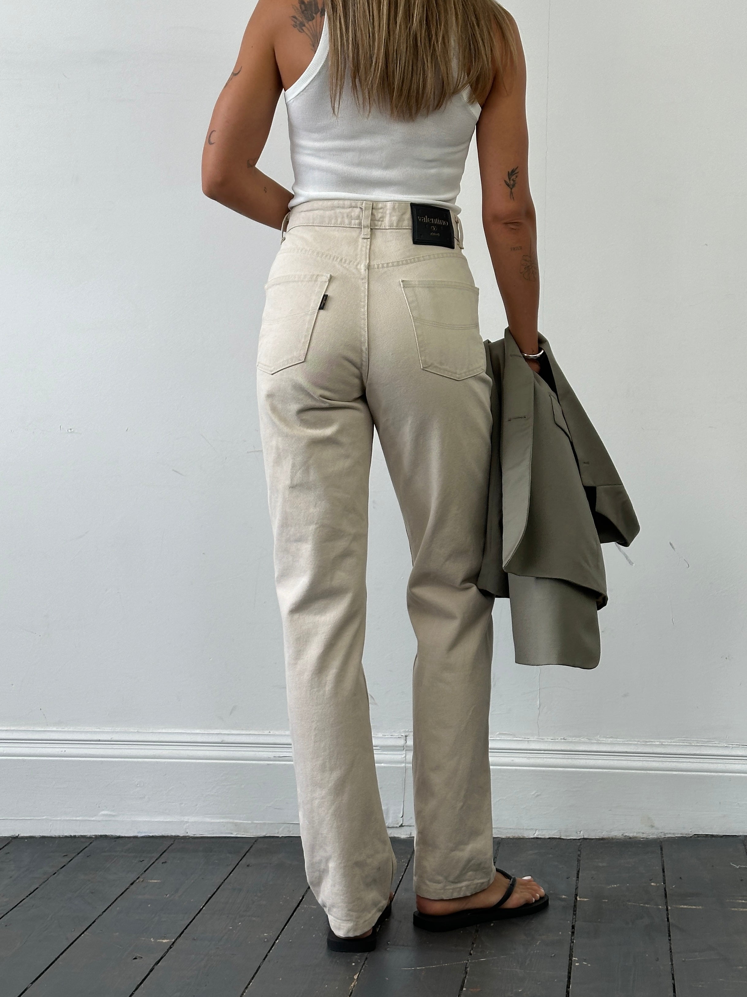 Valentino pure cotton high-waisted denim jeans in W26, showcasing classic blue wash and stylish fit on a model.