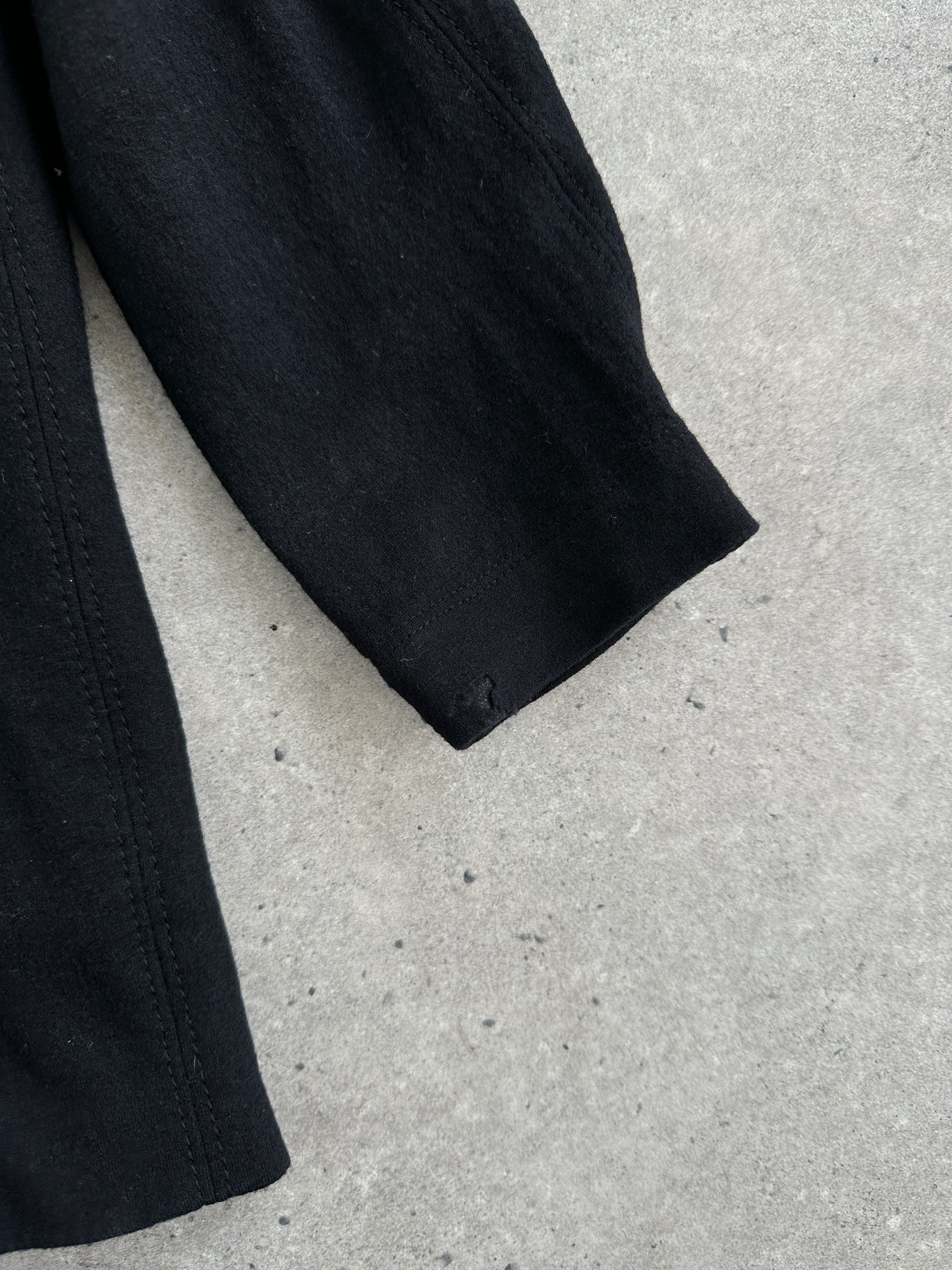 Helmut Lang asymmetric high-neck wool belted jacket in black, featuring a tailored fit and modern design.