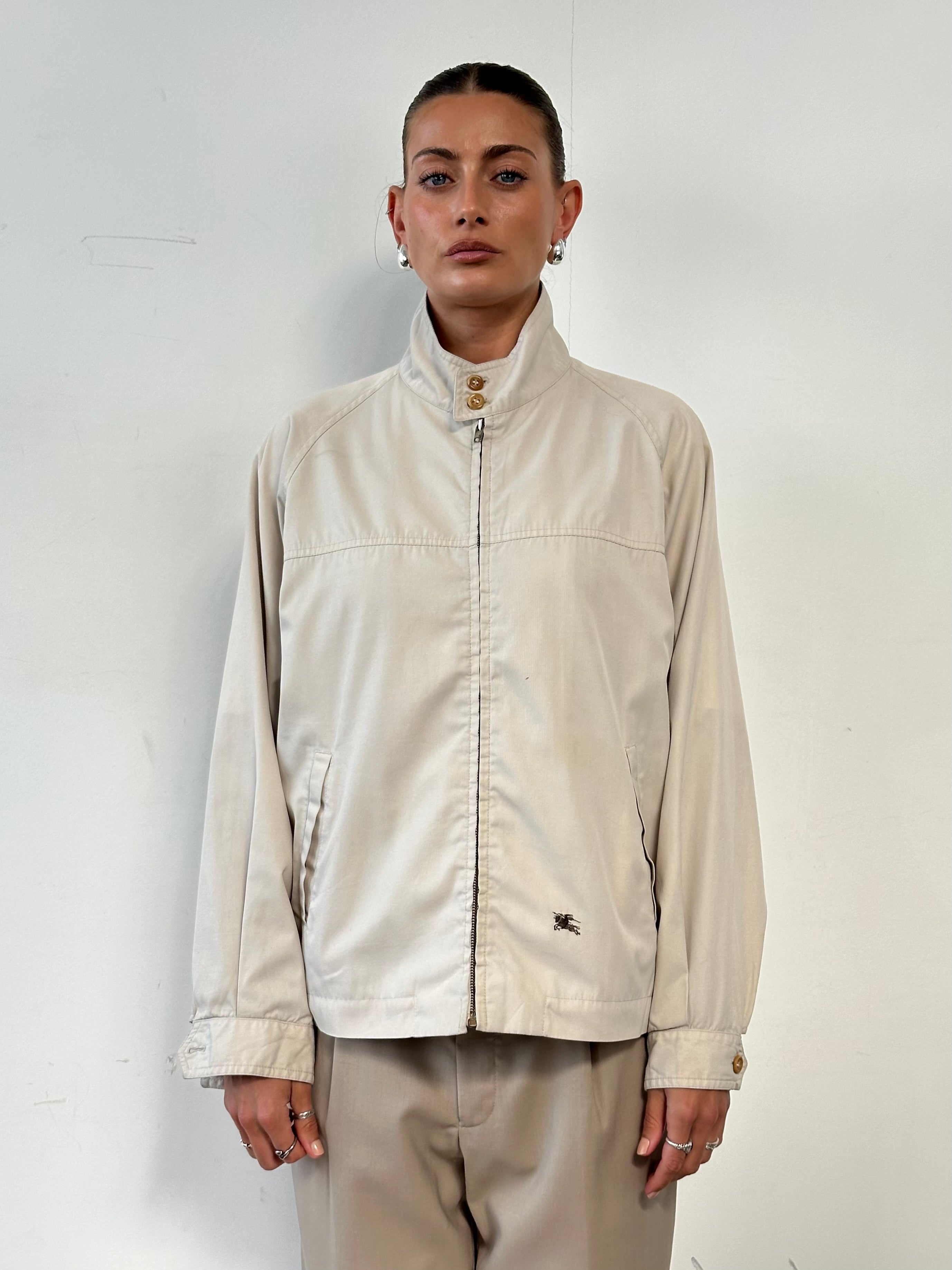 Burberry Nova Check logo bomber jacket in size L, featuring signature check pattern and classic bomber style.