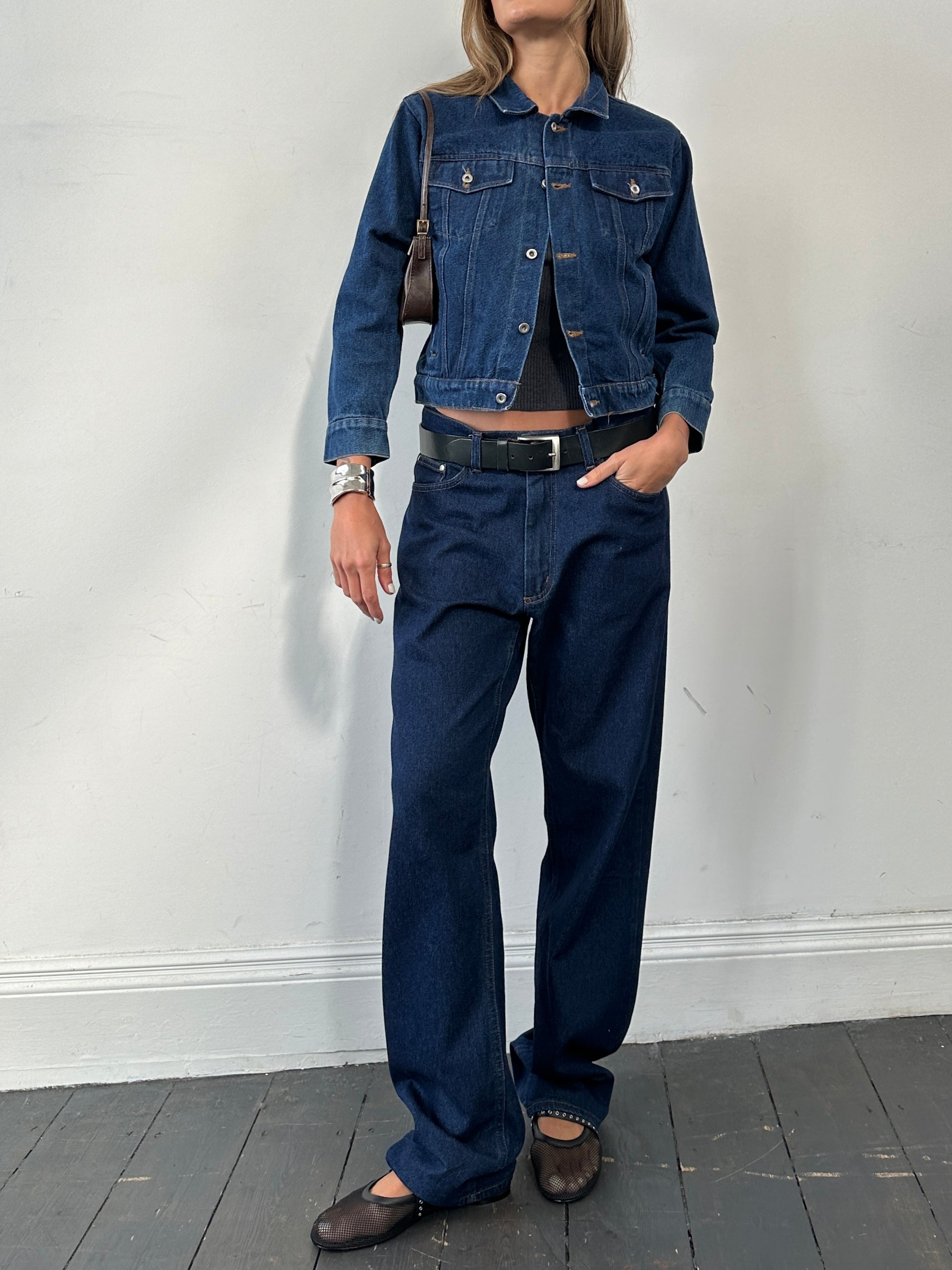 Valentino high waisted straight leg denim jeans in W34, showing the classic blue denim fabric and tailored fit.