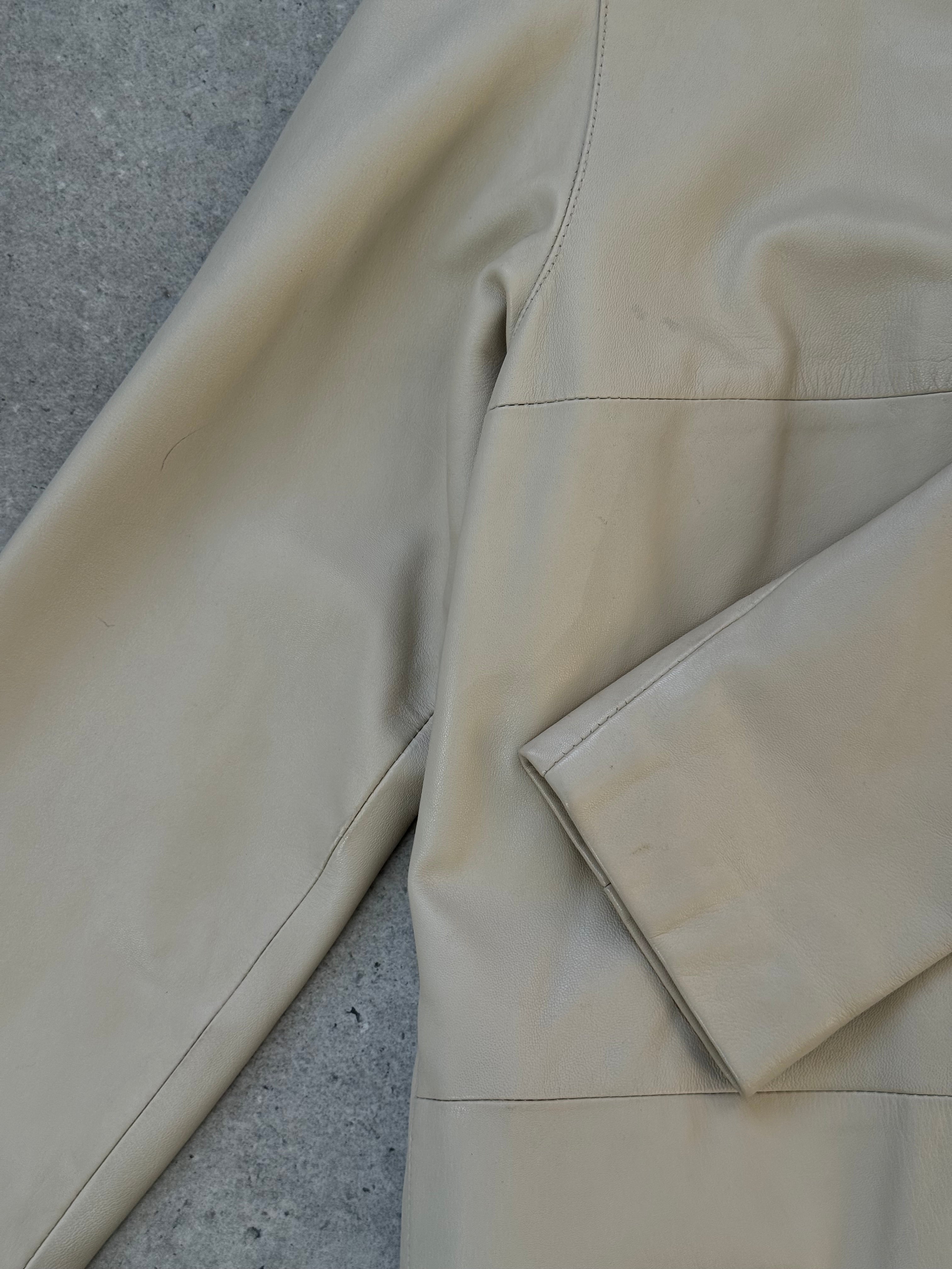 Vintage 1990s high neck leather trench coat, M/L size, classic leather jacket with a sleek design and vintage style.