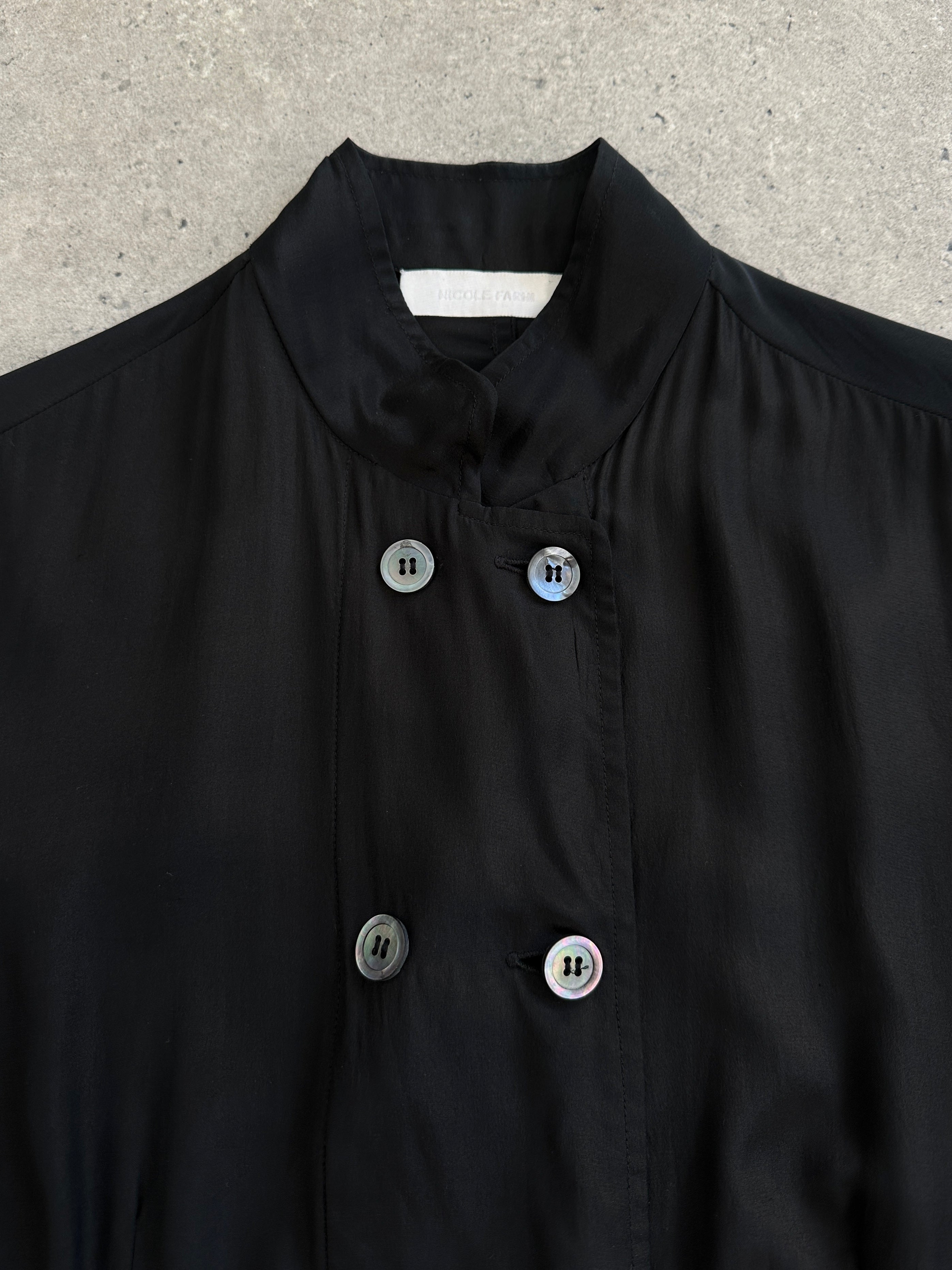 Nicole Farhi 2000s pure silk double-breasted shirt in size S/M, shown in a classic button-up style with a smooth silk fabric.