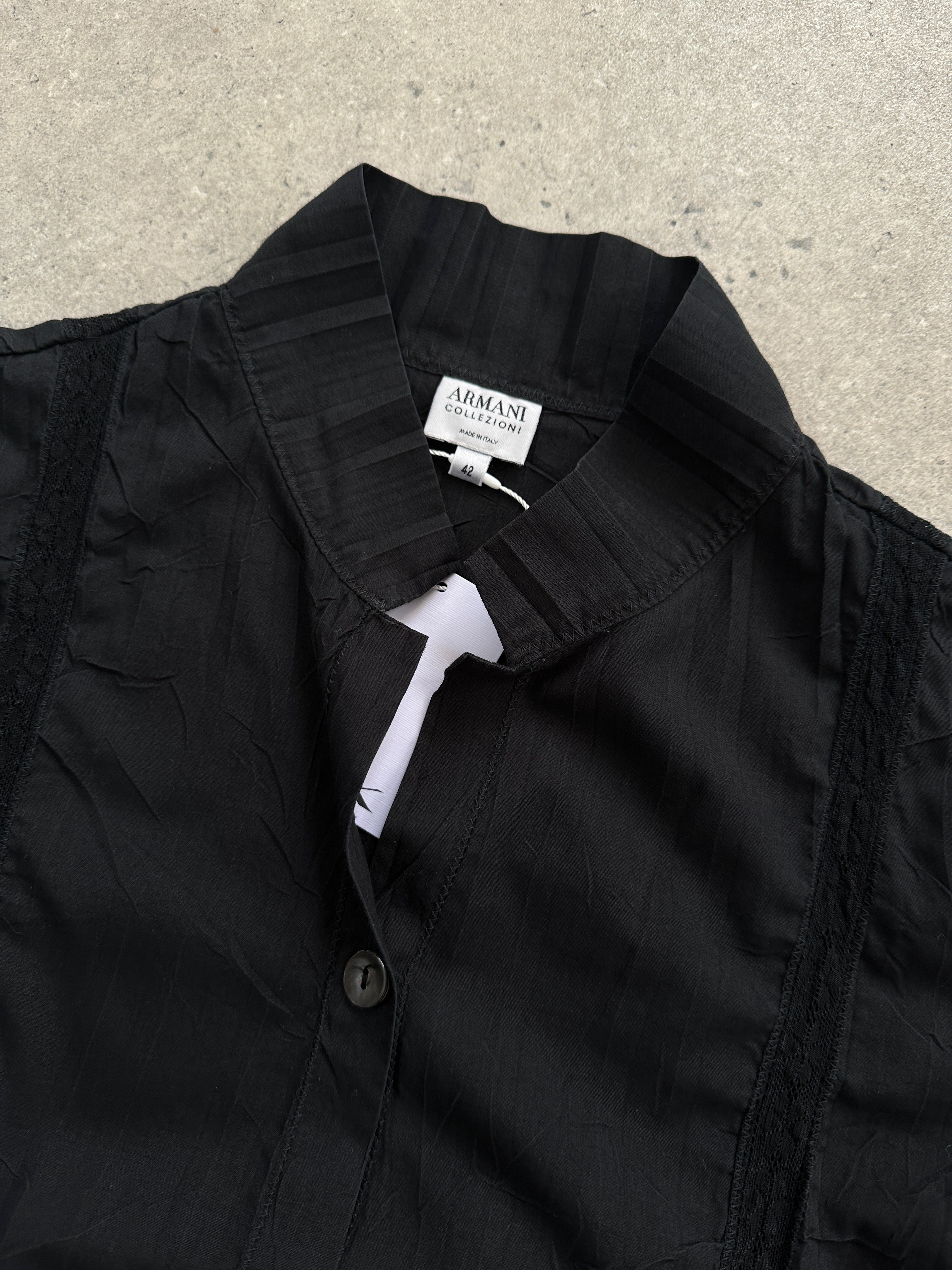 Armani Collezioni pleated lace panel shirt in size S, featuring a stylish design with pleats and lace details, shown on a hanger.