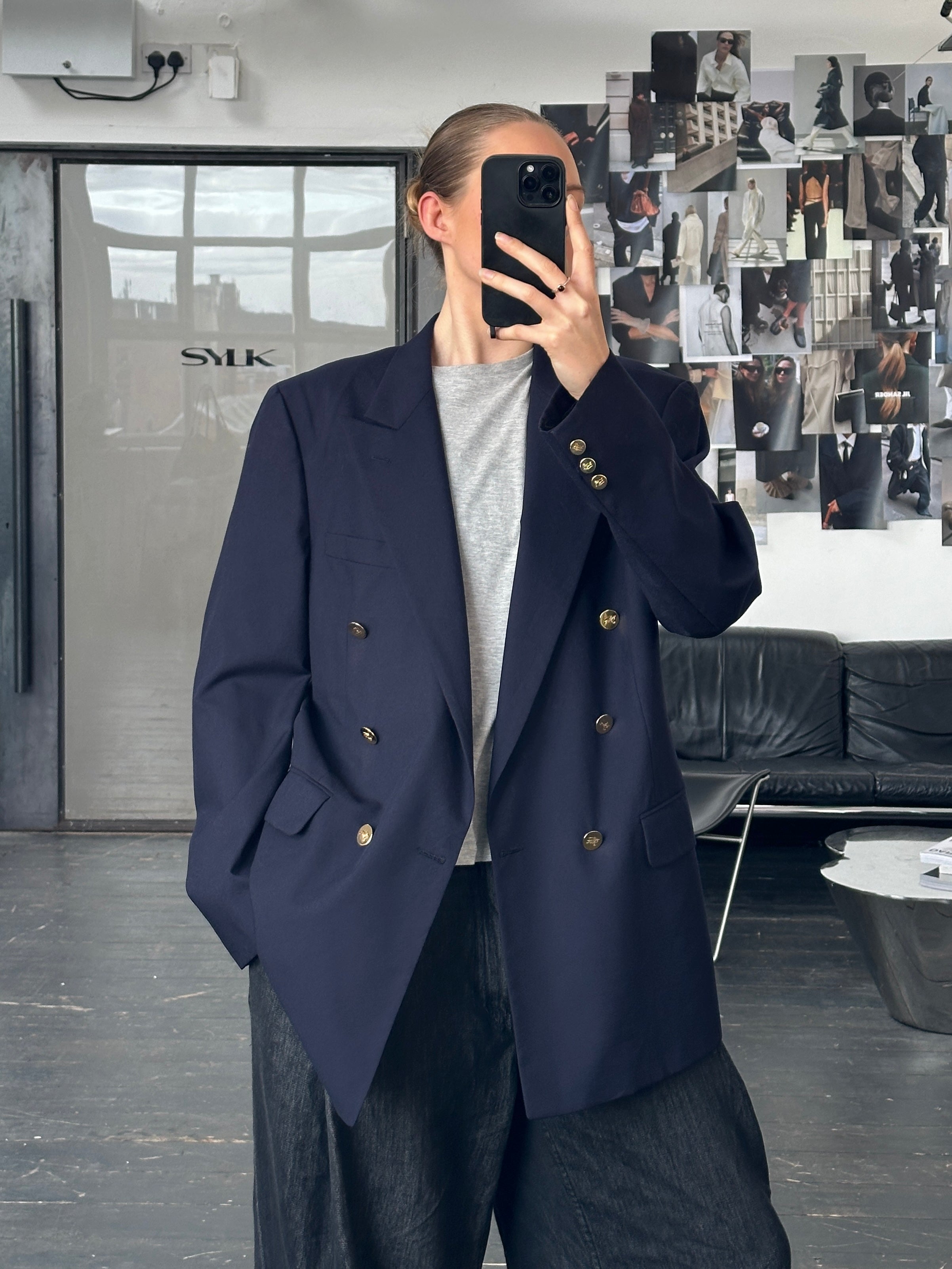 Burberry 1990s double-breasted bespoke wool blazer in size 42R/XL, featuring classic tailored design and signature check lining.