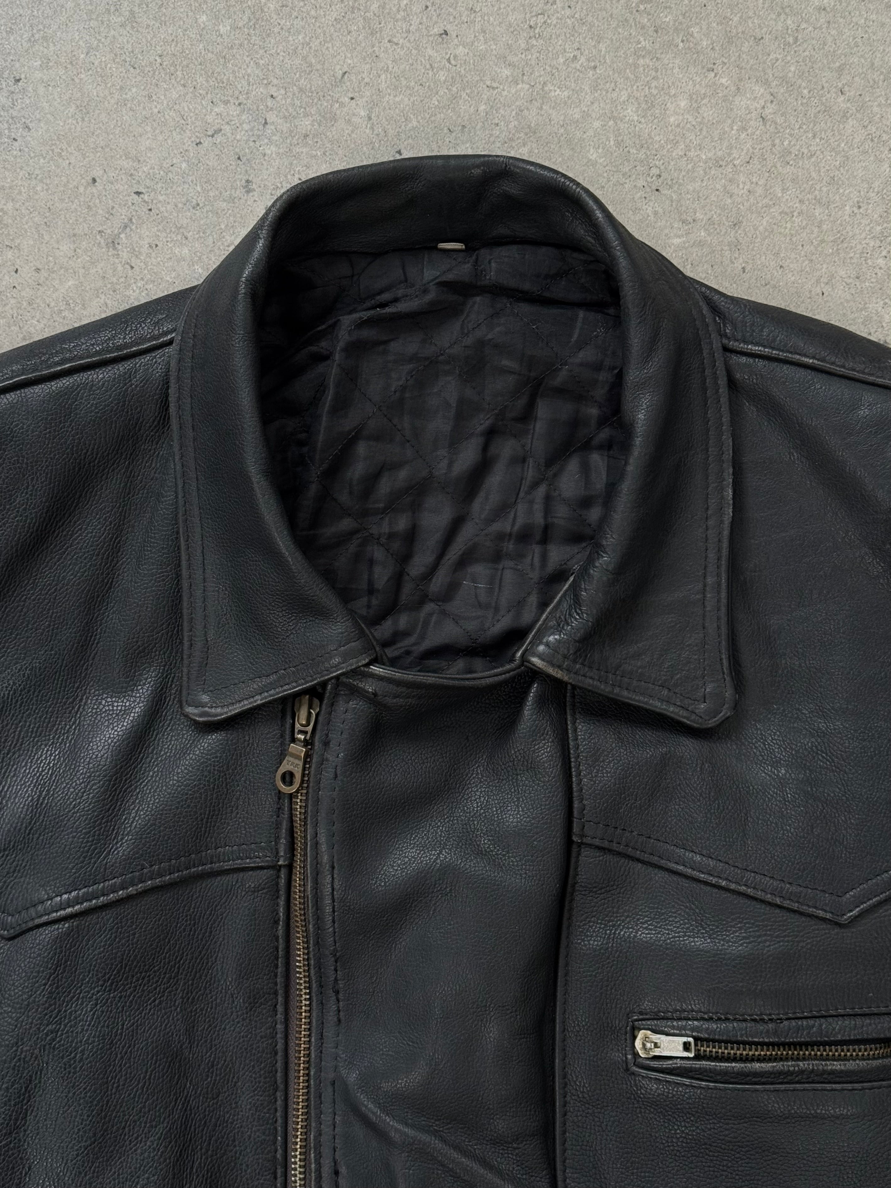 Vintage 1990s leather biker jacket in size M/L, featuring classic design with metal zipper and distressed leather details.