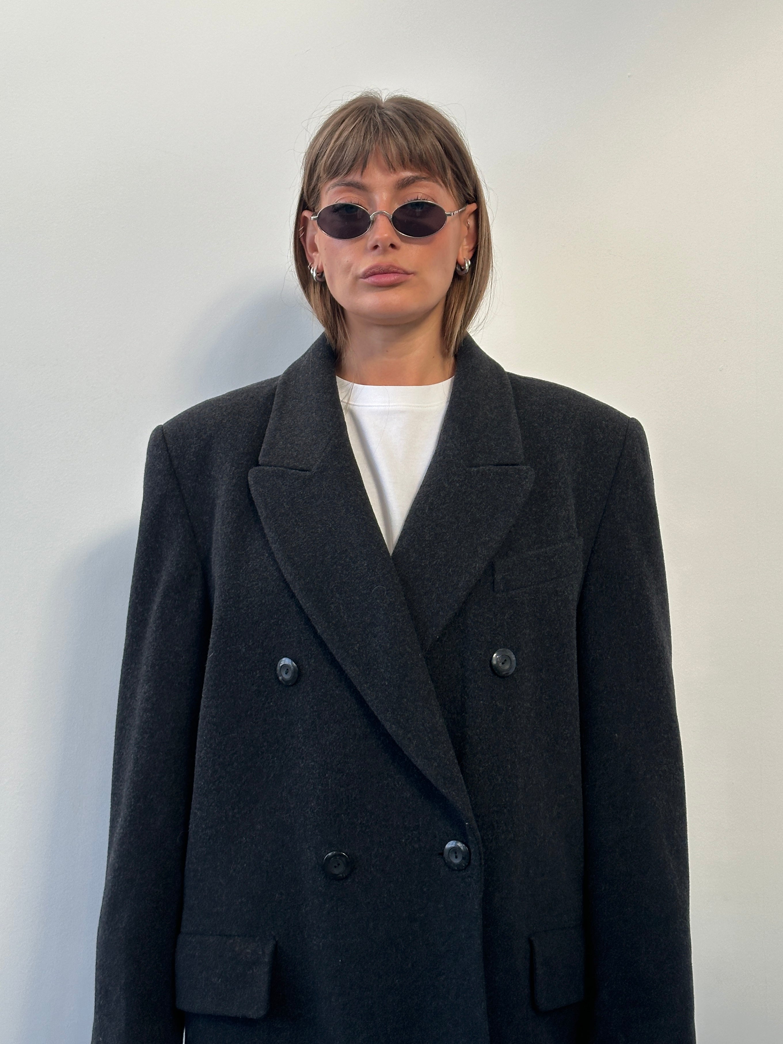 Vintage Italian 1980s pure wool double-breasted coat in XL, showcasing classic vintage style and tailored design.