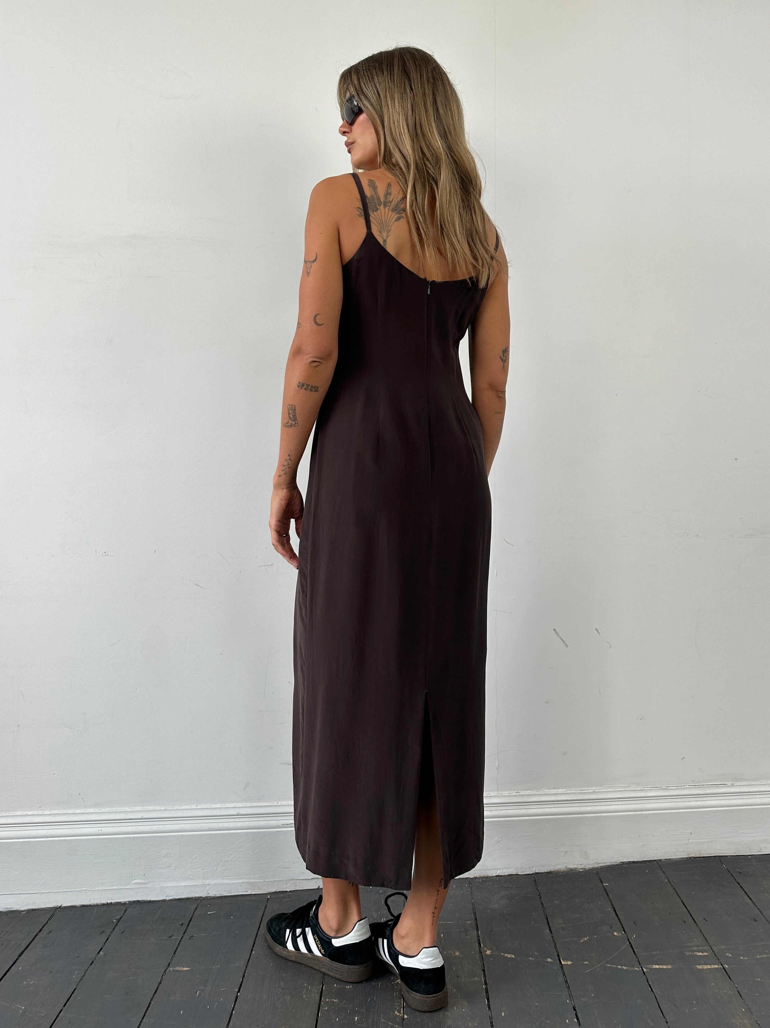 Laura Ashley pure silk floor length slip dress in size M, showing the elegant, flowing fabric and sleek design of the dress.