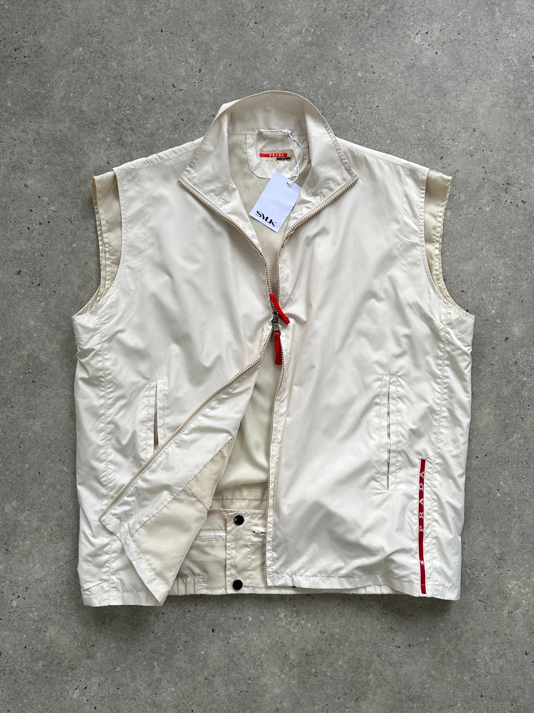 Prada sleeveless nylon vest with double zippers in size XL, featuring a sleek, modern design and lightweight construction.