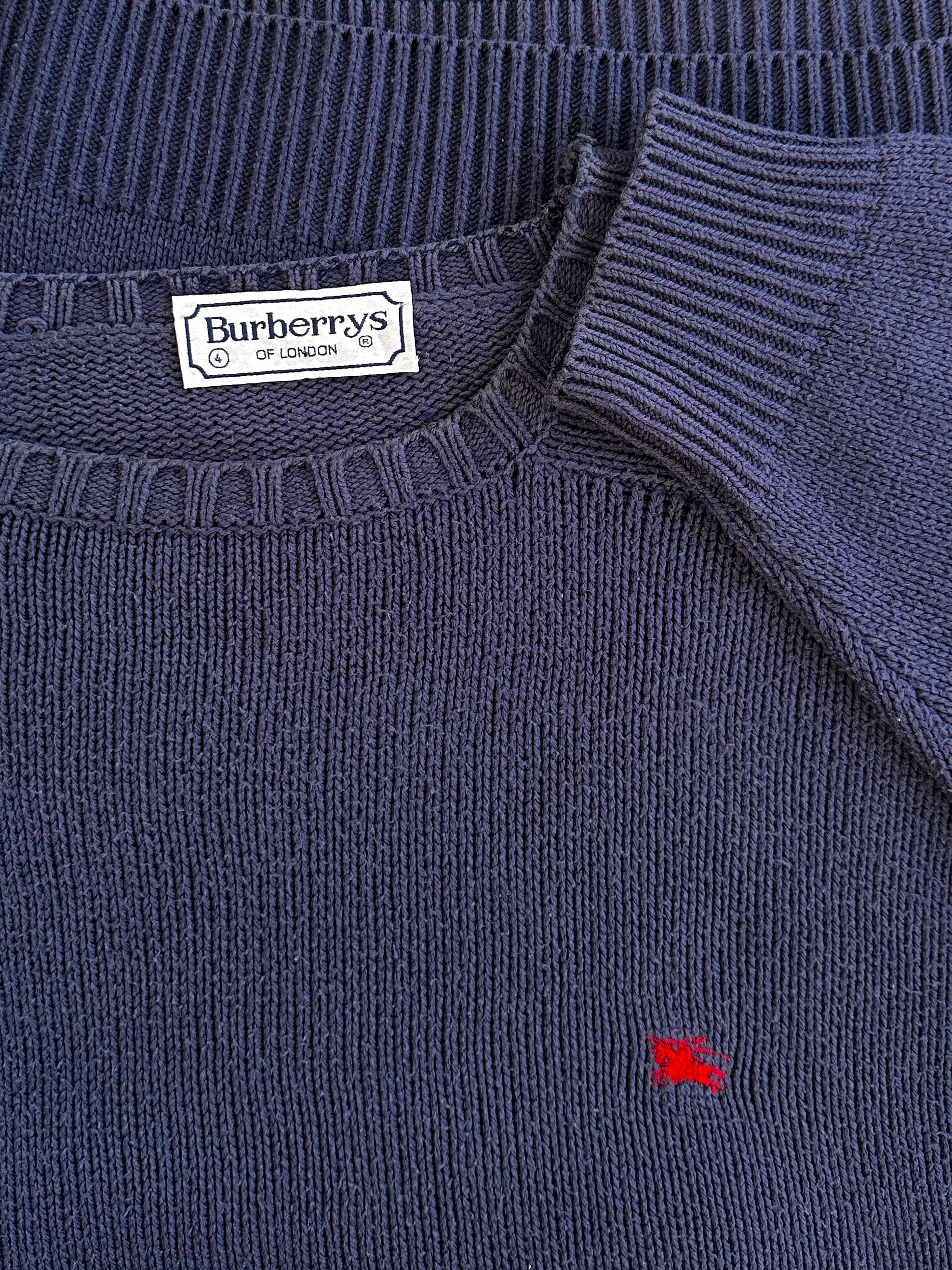 Burberry 1990s cotton logo knitted jumper in black, featuring the iconic check pattern and classic crew neck design.