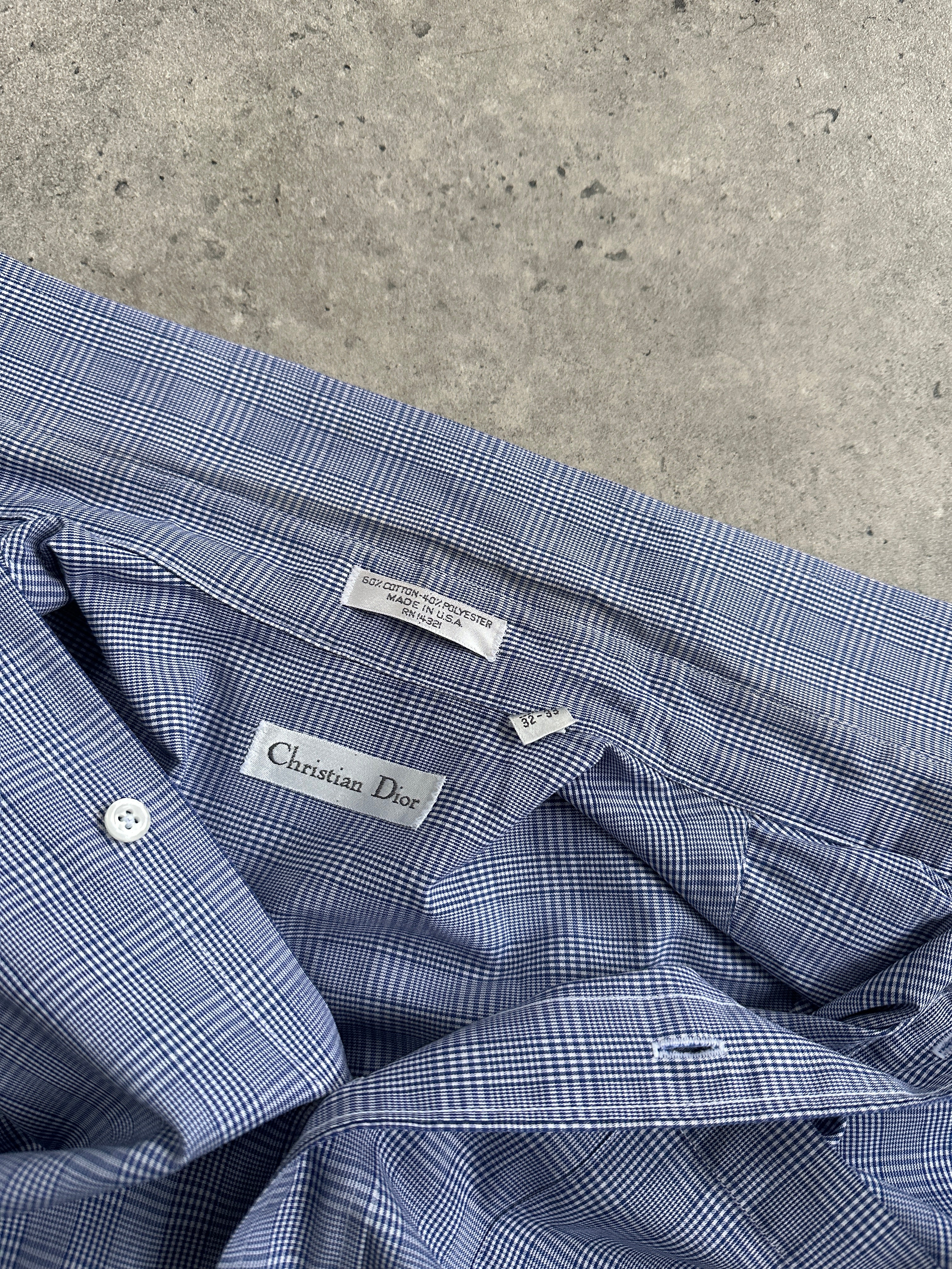 Christian Dior cotton check shirt in size L, featuring a classic plaid design and button-down collar.