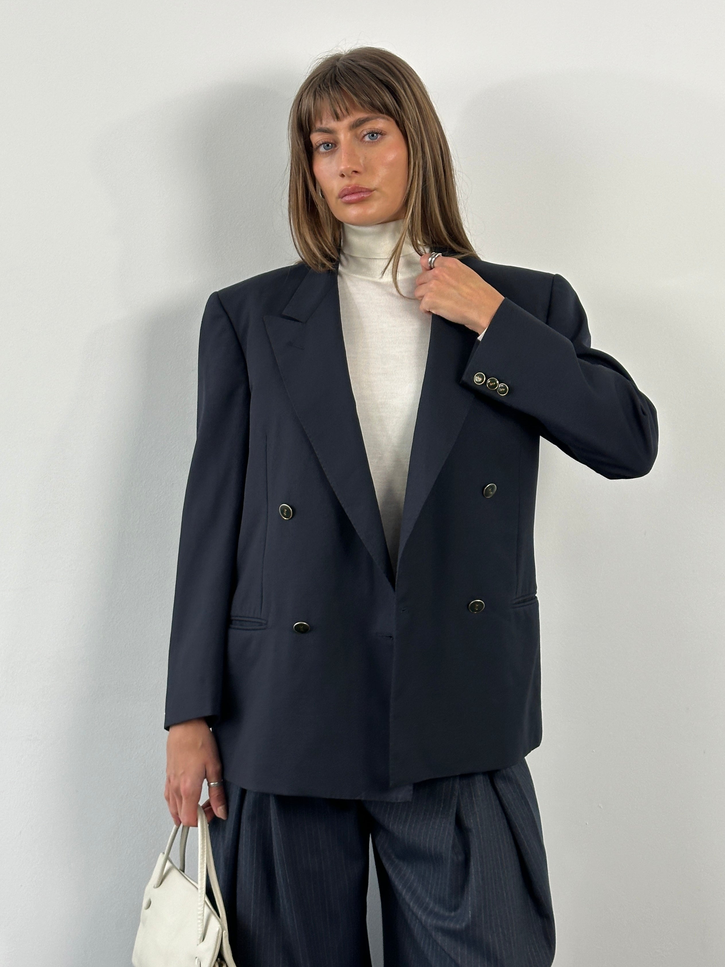 Yves Saint Laurent 1990s bespoke button wool double-breasted blazer, size 38R, in classic tailored style with structured fit.