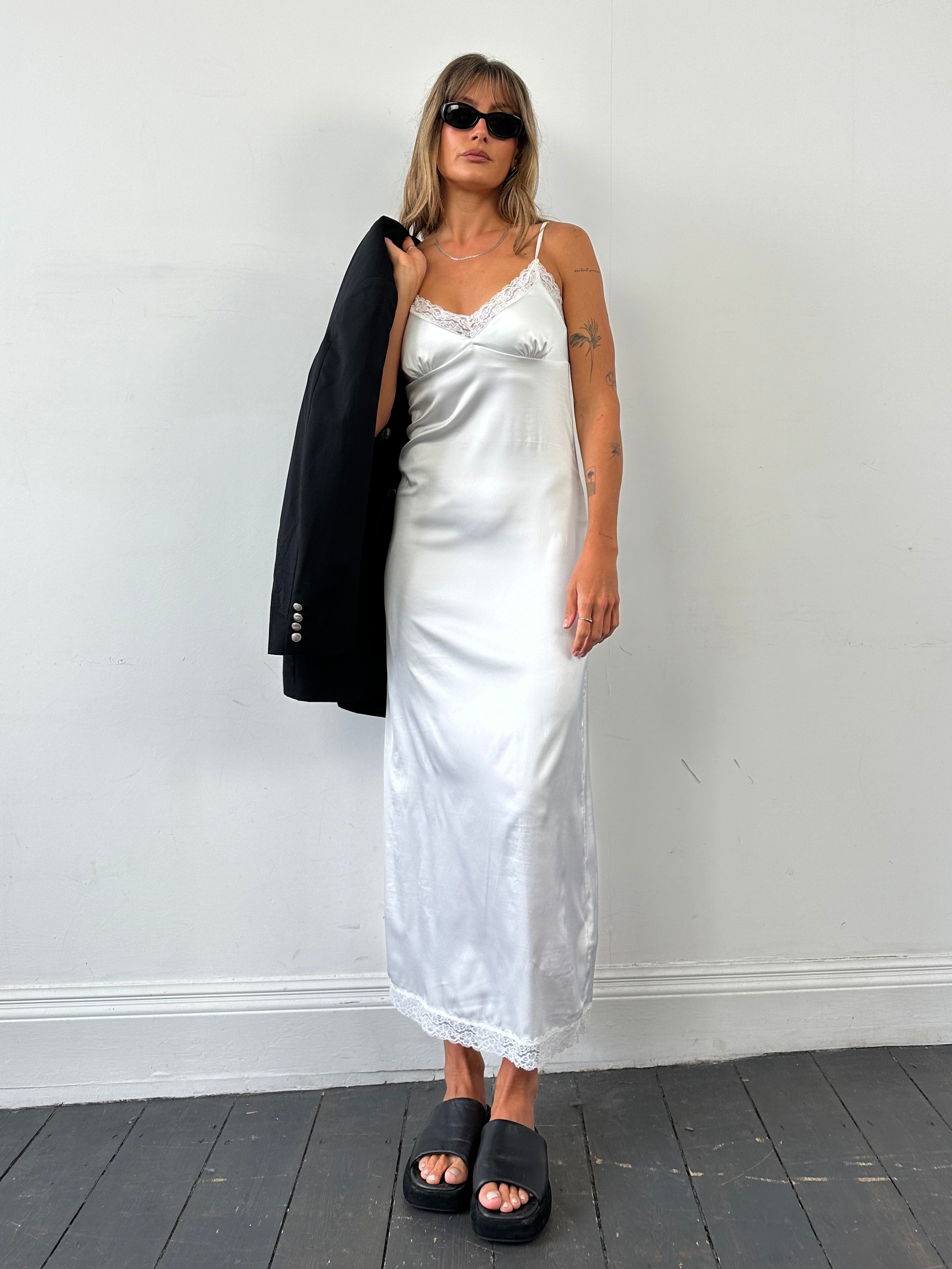 Vintage satin lace trim floor length slip dress, size small, featuring elegant lace details and a smooth satin finish.